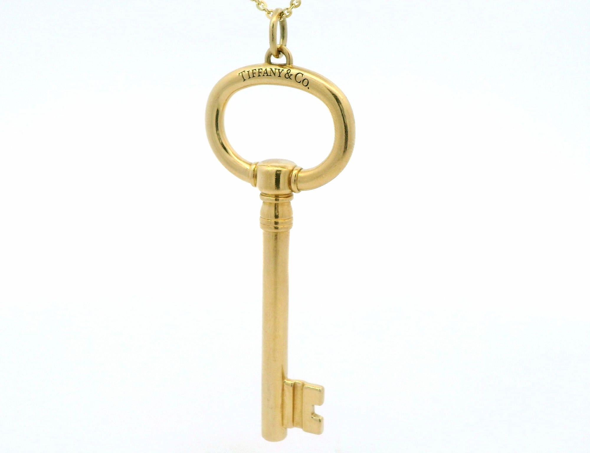 Tiffany & Co. yellow gold key pendant For Sale 1