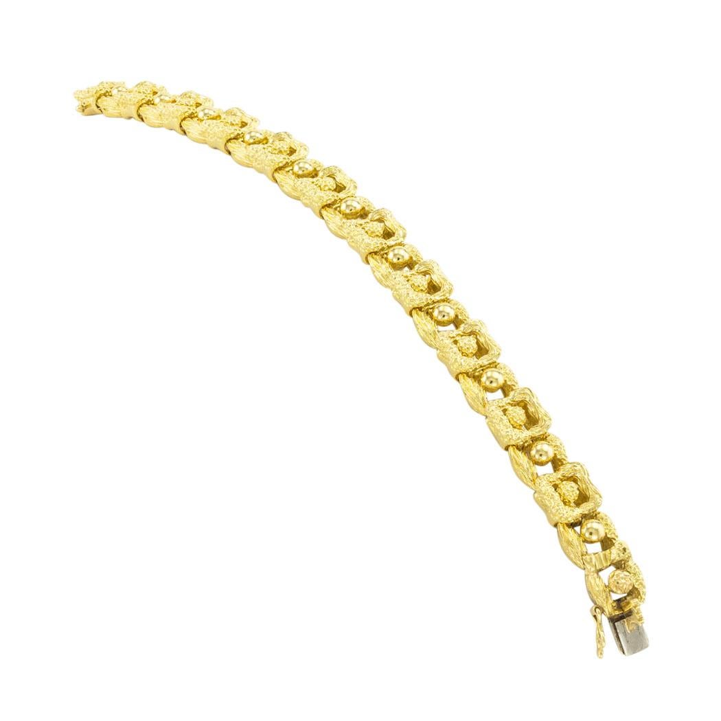 Tiffany & Co yellow gold link bracelet circa 1980. 

SPECIFICATIONS:

METAL:  18-karat yellow gold.

WEIGHT:  53.6 grams.

HALLMARKS:  signed Tiffany & Co.

BRACELET CLASP:  plunger clasp with added safety figure eight.

MEASUREMENTS:  approximately