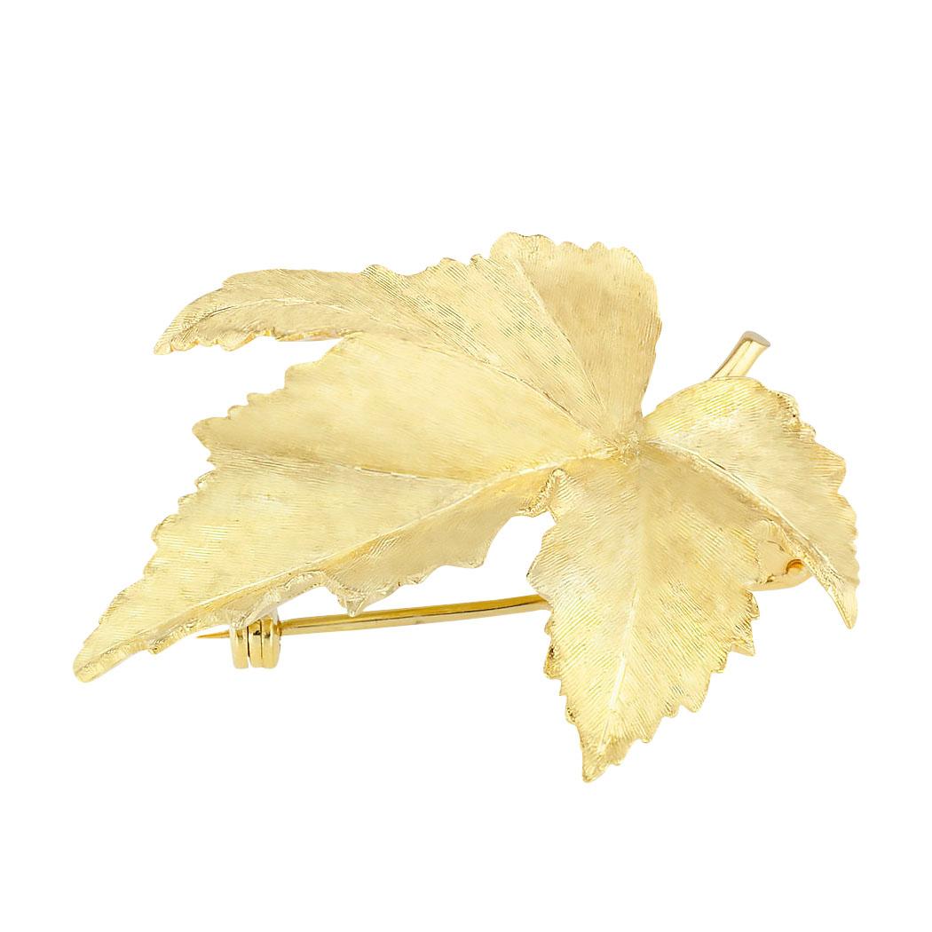 Tiffany & Co estate yellow gold maple leaf brooch circa 1970.  Love it because it caught your eye, and we are here to connect you with beautiful and affordable jewelry.  Decorate Yourself!  Simple and concise information you want to know is listed