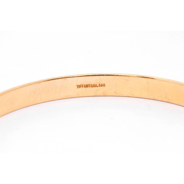 Tiffany and Co. Yellow Gold Oval Bangle Bracelet at 1stDibs