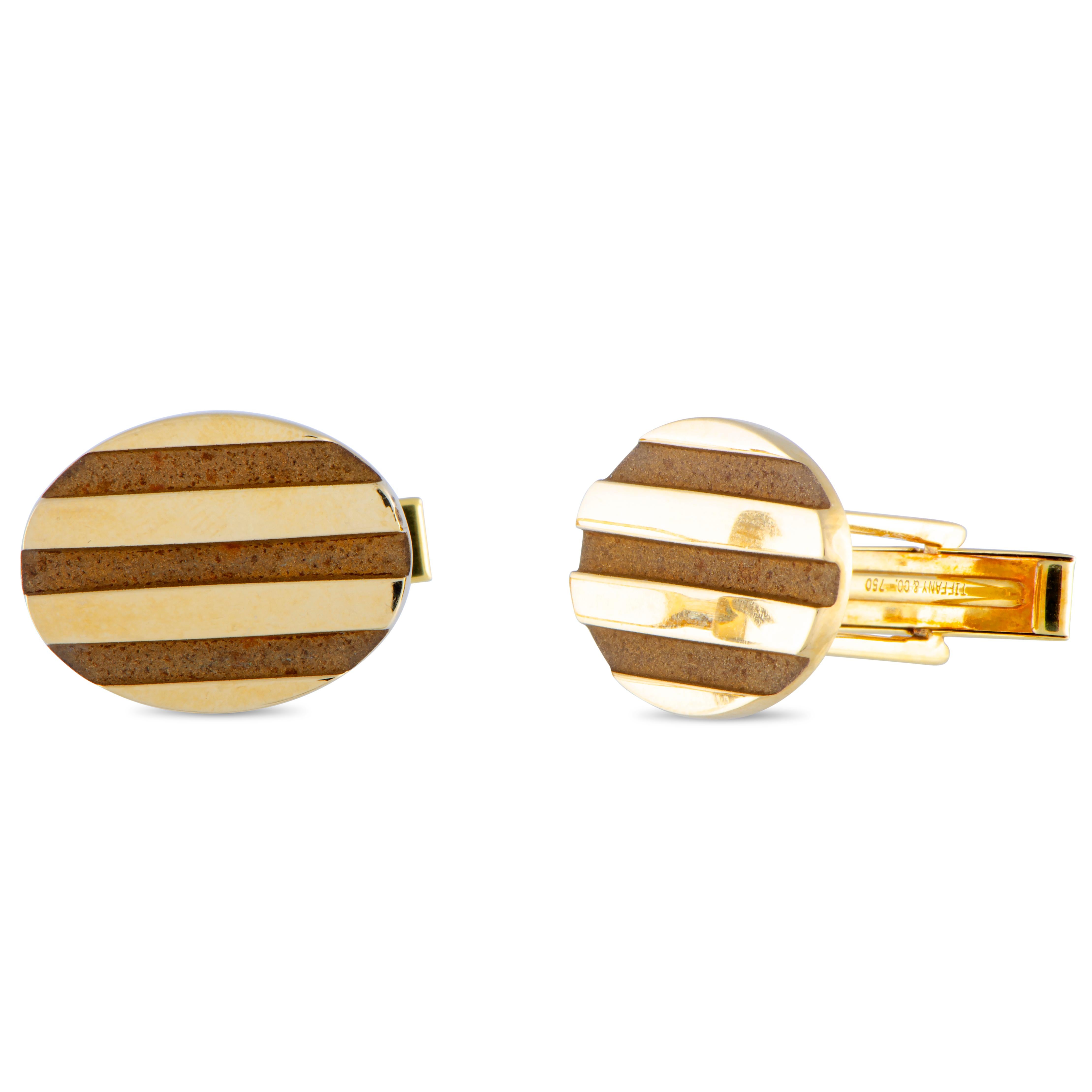 These exceptionally elegant cufflinks are created by Tiffany & Co. and boast a splendidly understated design that is beautifully presented in classy 18K yellow gold, offering an incredibly prestigious look. The pair is made of 18K yellow gold and