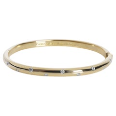 Tiffany 
Co. Yellow Gold 
Platinum Diamond Etoile Bracelet