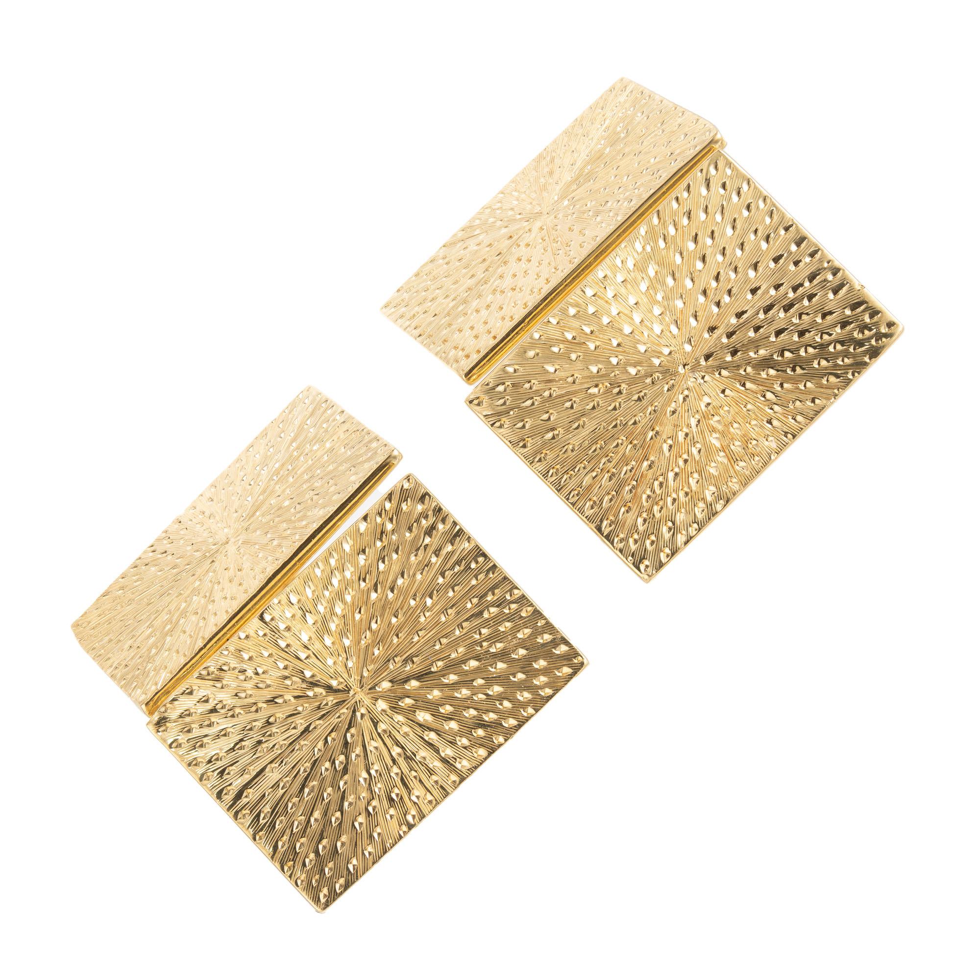 Crafted by Tiffany & Co, these 1960's yellow Gold rectangular cufflinks are solid 18k, double sided, and hand textured. An interesting artistic piece that is a timeless accessory for any formal occasion. Perfect for anyone who appreciates fine