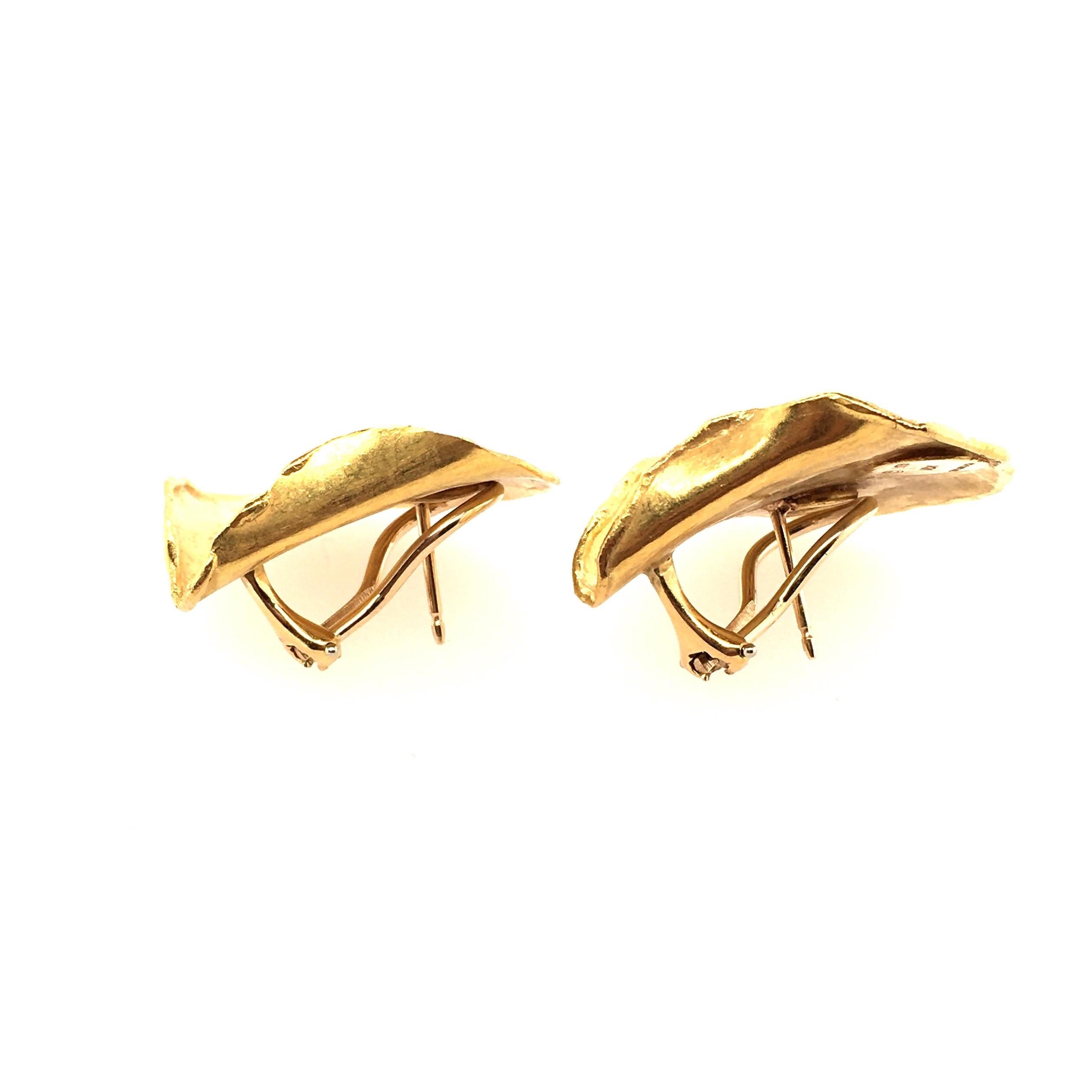 A pair of 18 karat yellow gold rose petal earrings.  Tiffany & Co. 1979. Length is approximately 1 1/4 inches, gross weight is approximately 10.2 grams. Stamped Tiffany & Co, 18k, 1979.