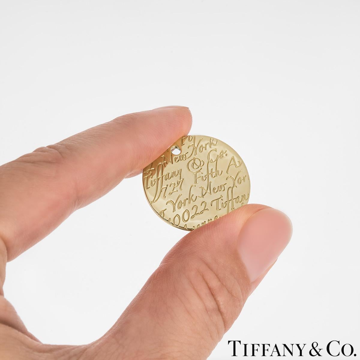 Tiffany & Co. Pendentif Notes rondes en or jaune en vente 3