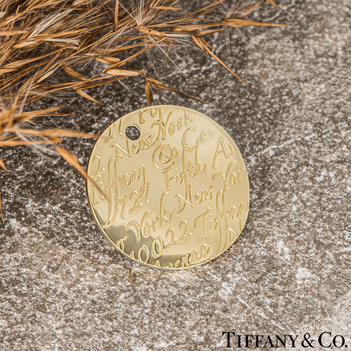 Tiffany & Co. Yellow Gold Round Notes Pendant For Sale 1