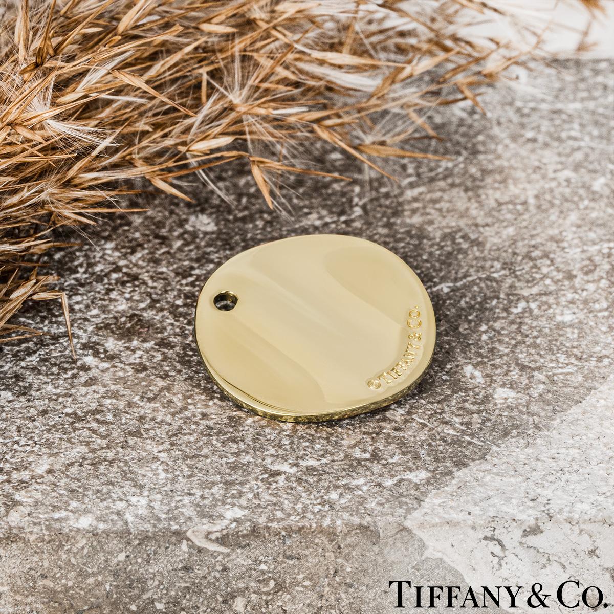 Tiffany & Co. Yellow Gold Round Notes Pendant For Sale 2