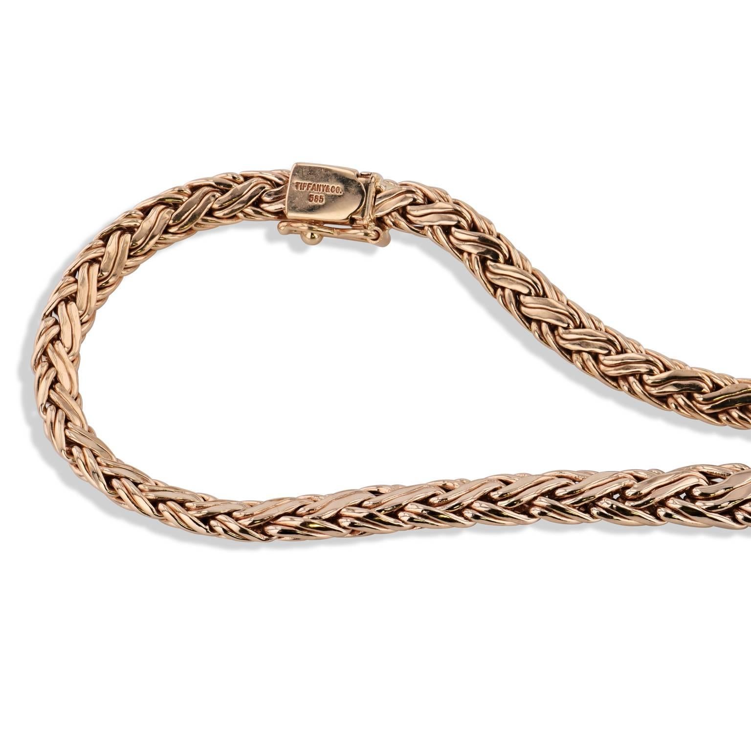 Enjoy this previously loved Tiffany & Co. 14 karat yellow gold Russian weave necklace measuring 16 inches.