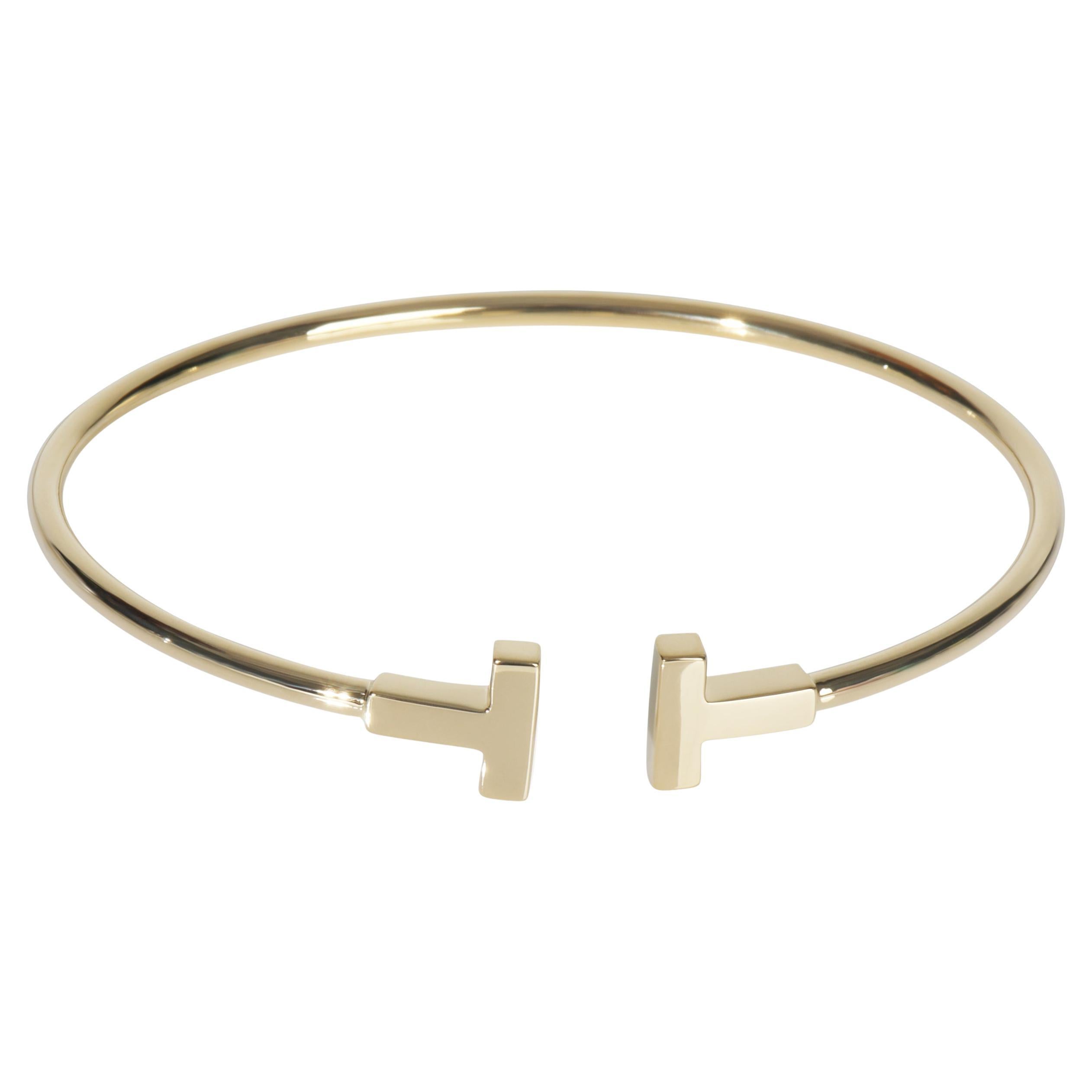 Tiffany
Co. Yellow Gold Tiffany T Narrow Wire Bracelet
