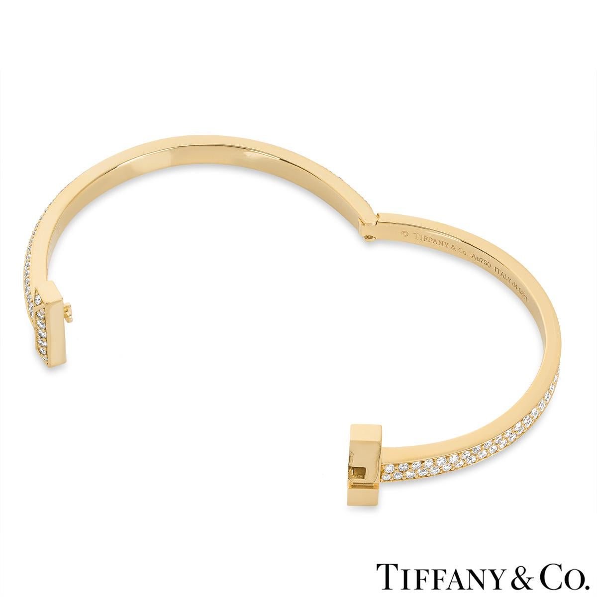 Tiffany & Co. Yellow Gold Tiffany T1 Wide Diamond Hinged Bracelet In Excellent Condition In London, GB