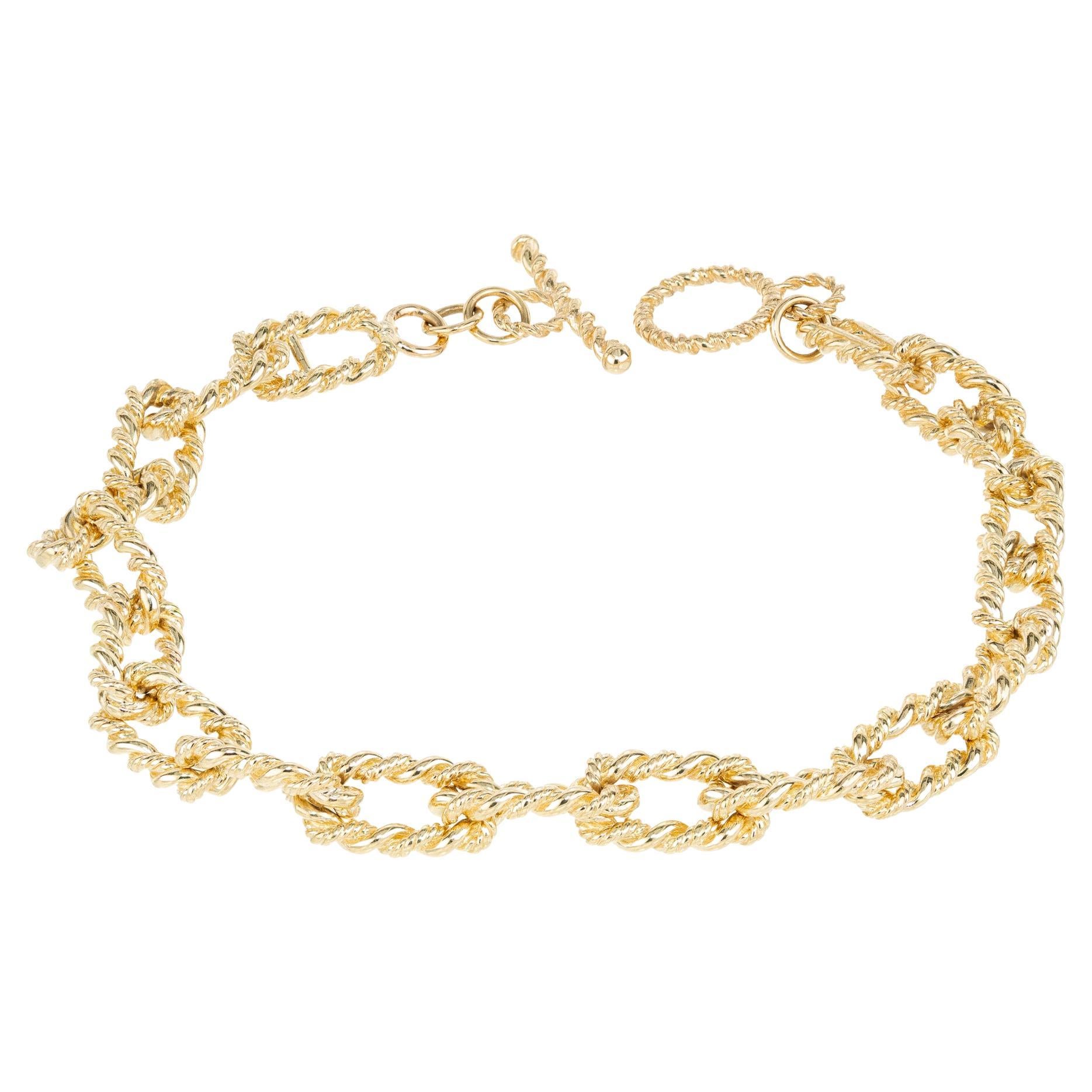Tiffany & Co. Verdrilltes Drahtbügelarmband aus Gelbgold A Link & Co.