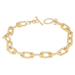 Tiffany & Co. Verdrilltes Drahtbügelarmband aus Gelbgold A Link & Co.