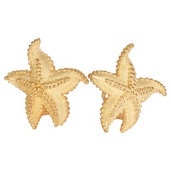 Tiffany
Co. Boucles d
oreilles étoile de mer vintage en or jaune