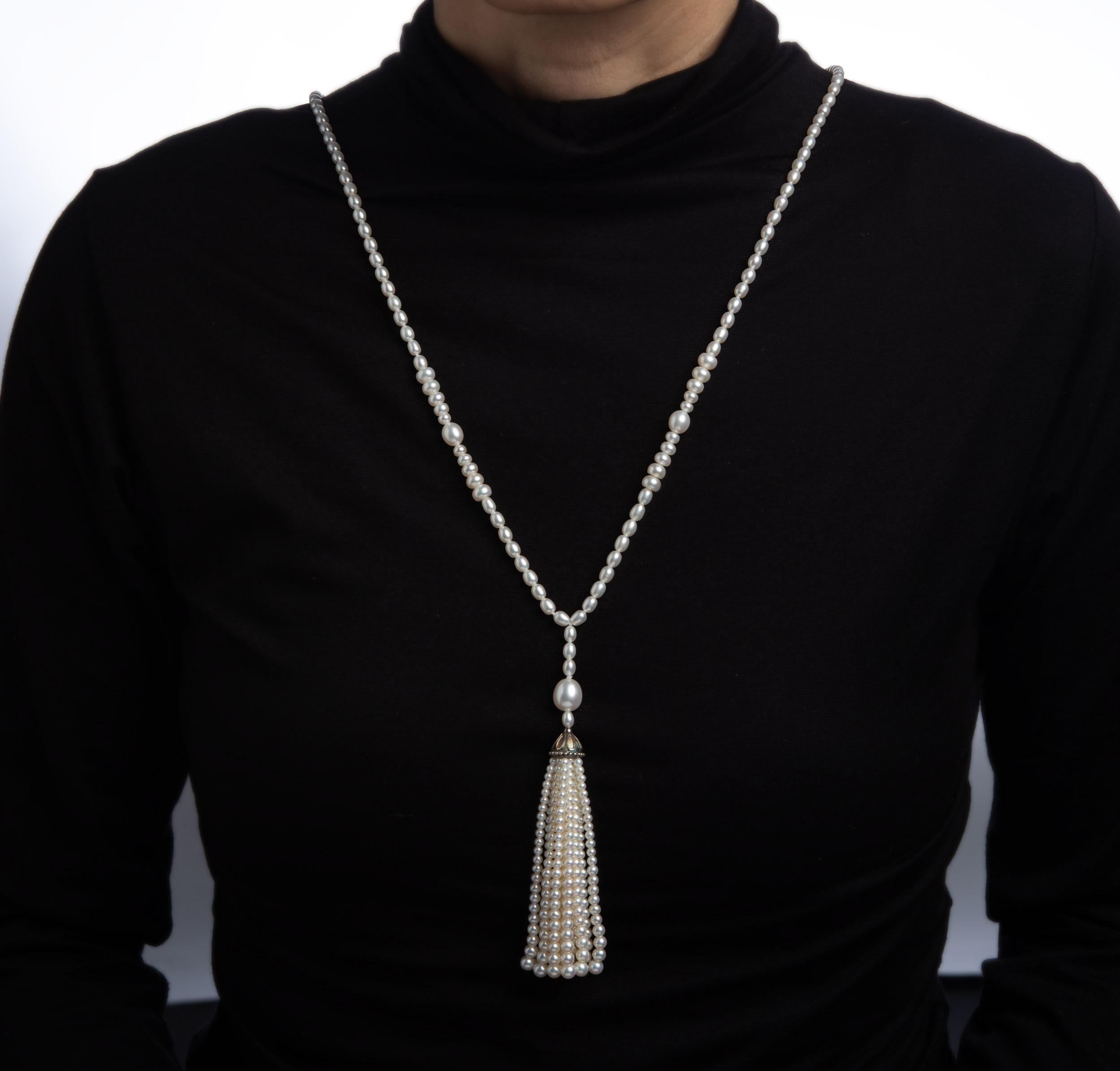 Stylish pre-owned Tiffany & Co Ziegfeld long freshwater cultured pearl necklace.   
The necklace is strung with a graduation of freshwater cultured pearls ranging in size from 4.2mm to 9.5mm. The pearls exhibit excellent luster and are meticulously
