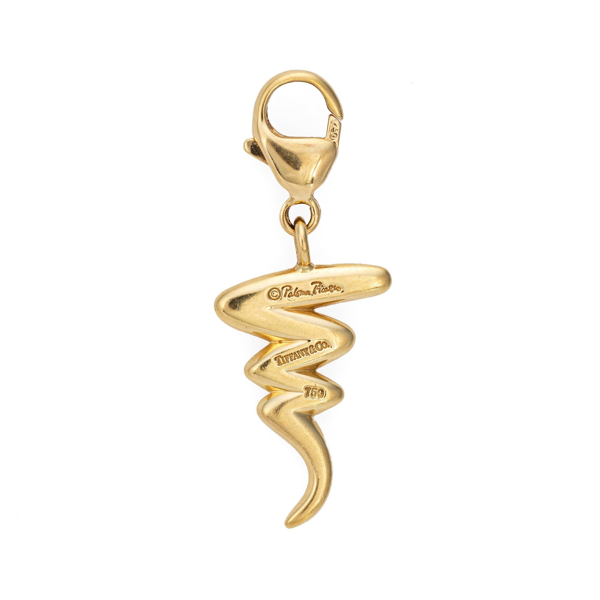 Finely detailed estate Tiffany & Co 'zig zag' charm designed by Paloma Picasso, crafted in 18 karat yellow gold.  

The charm is a hard-to-find retired piece and no longer made by Tiffany & Co. The 'zig zag' is a classic design by the famed Paloma