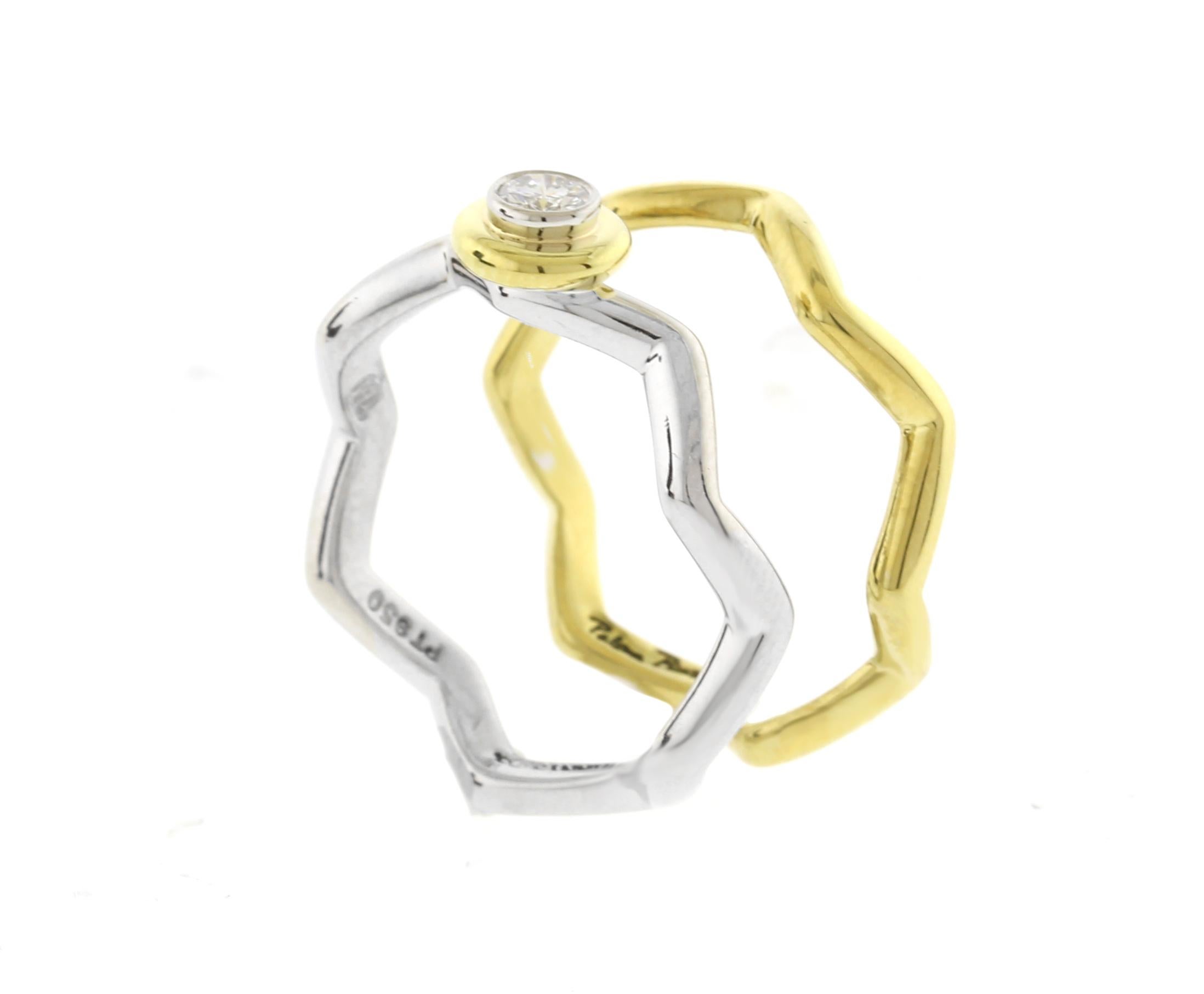 Discover the exquisite artistry of Tiffany & Co. with this stunning Paloma Picasso Zig Zag diamond solitaire ring. Featuring a sleek platinum shank, this ring is adorned with an 18kt yellow gold donut that beautifully surrounds a bezel-set diamond