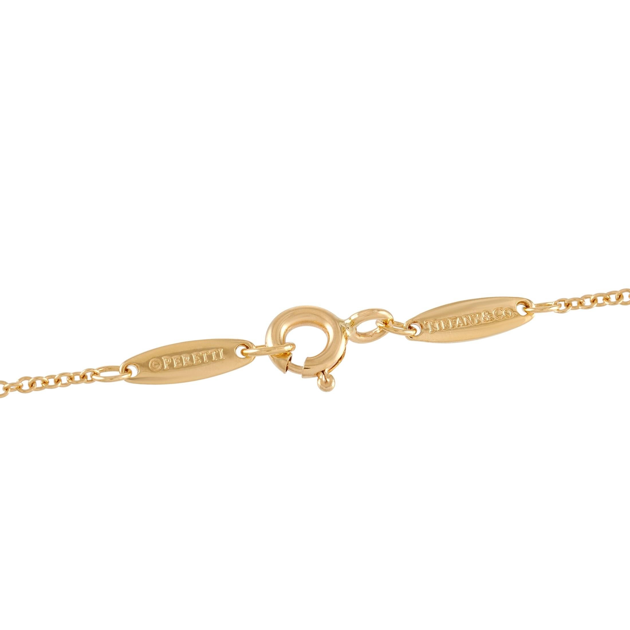 Round Cut Tiffany & Co. 18 Karat Yellow Gold 0.08 Carat Diamond Solitaire Necklace