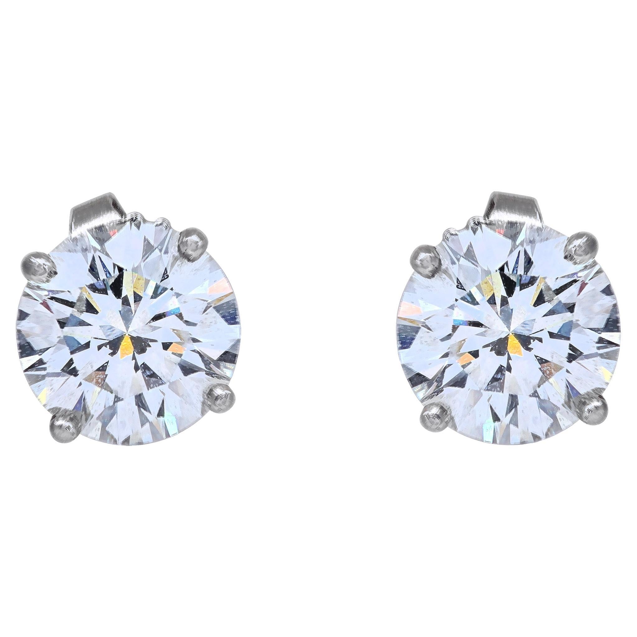 Tiffany & Co.diamond studs 1.04 ct & 1.03 ct H, VS1