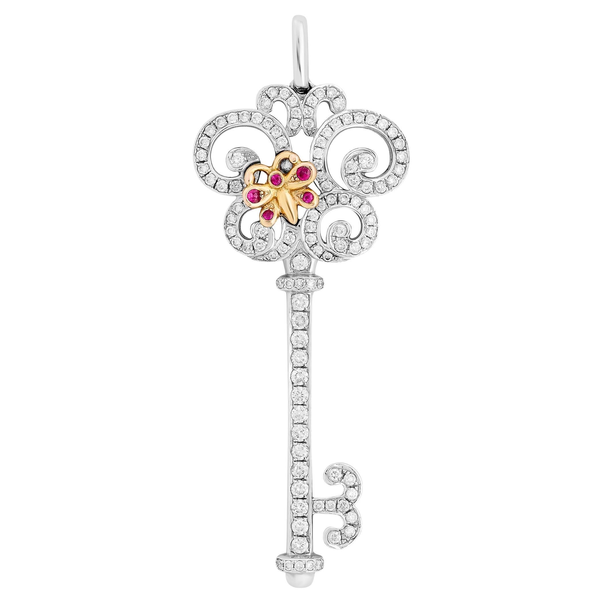 Tiffany 
Company 18K Two Tone Gold Ruby and Diamond Butterfly Key Pendant For Sale