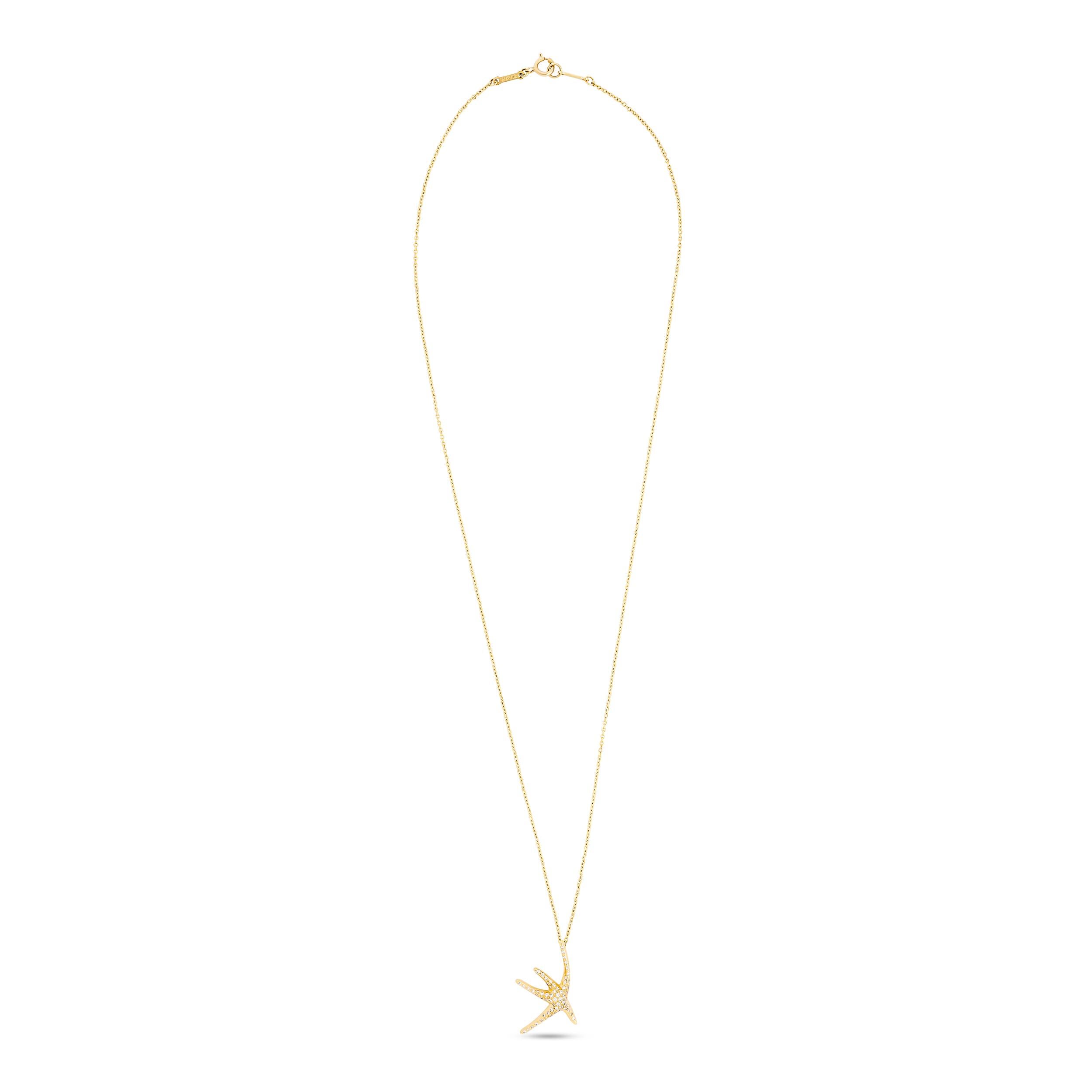 This is a Tiffany & Co. Starfish pendant from the Elsa Peretti collection, crafted in yellow gold and featuring a stylized, abstract starfish silhouette that is pavé-set with round brilliant-cut diamonds.

The total diamond weight is approximately