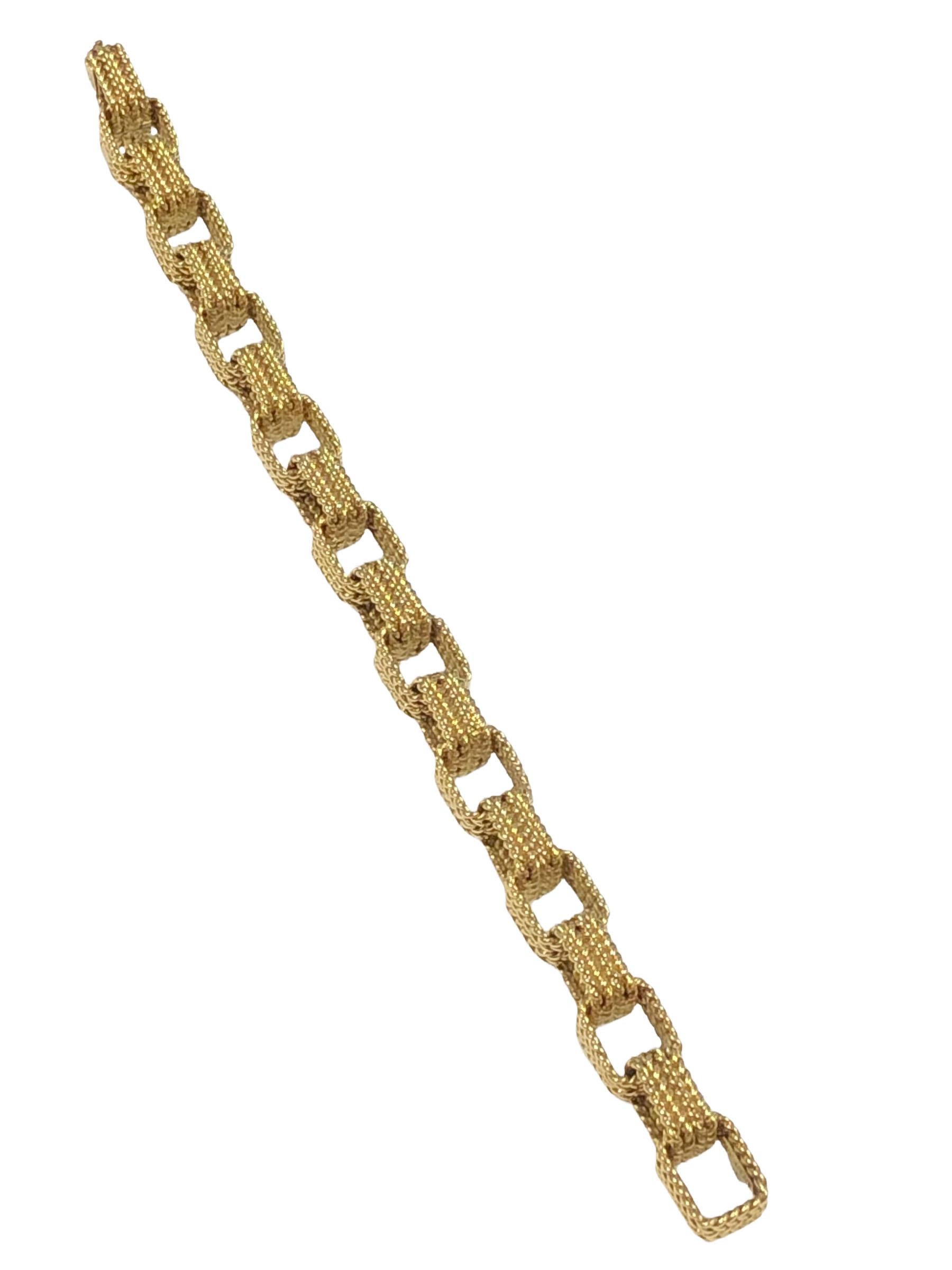 Circa 1960s Tiffany & Company 18k Yellow Gold Box Link Bracelet, measuring 8 inches in length 3/16 inch wide and weighing 60.4 Grams. Each link is comprised of 2 double row twisted rope wire. 