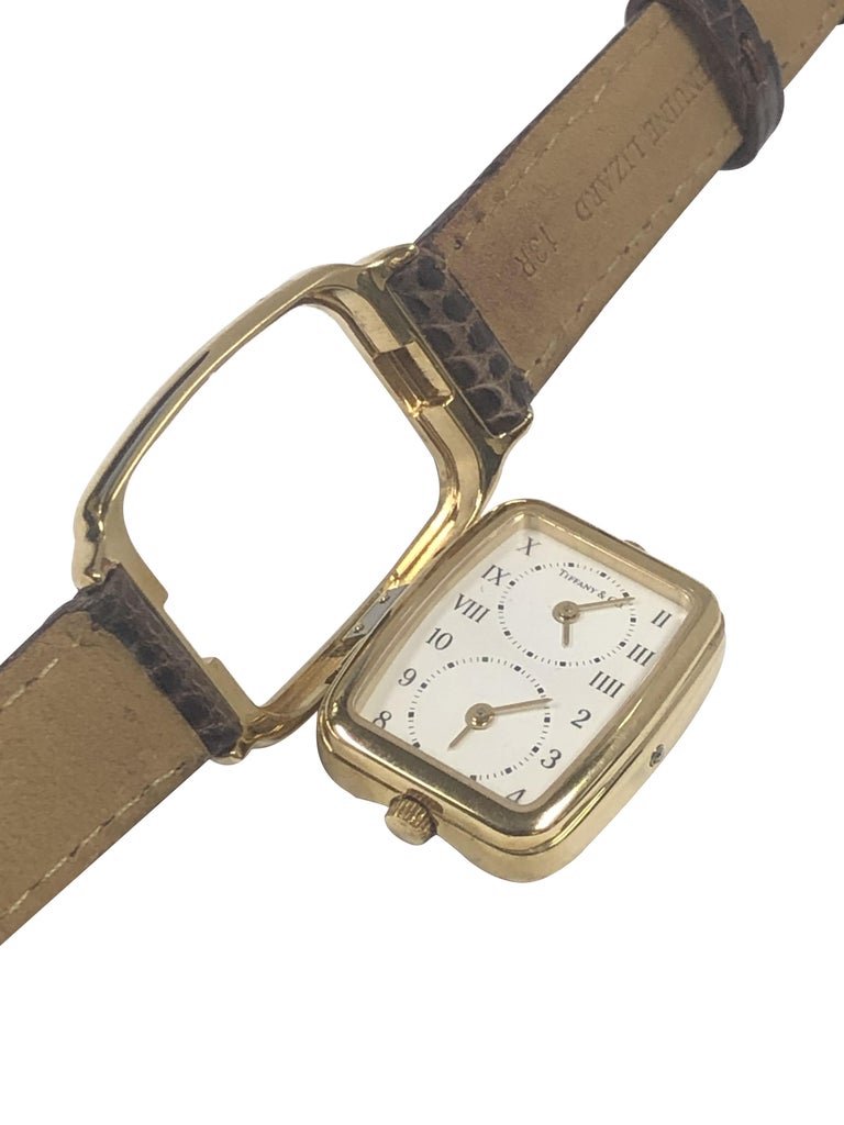 Tiffany and Company 2 Time Zone Yellow Gold Mid Size Wrist Watch at 1stDibs