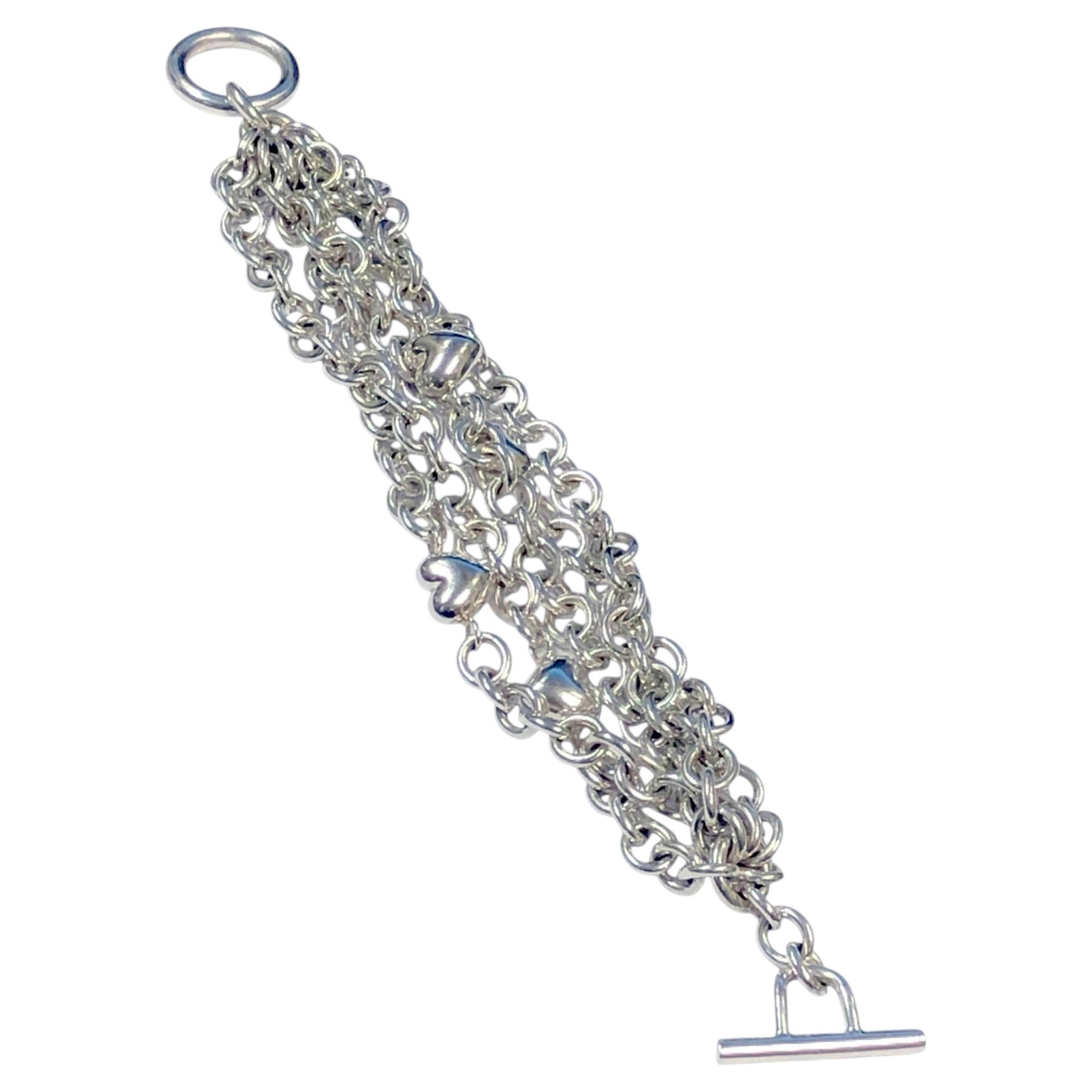 Pulsera de plata de ley con cierre de palanca y corazones abombados de 5 hileras de Tiffany & Company