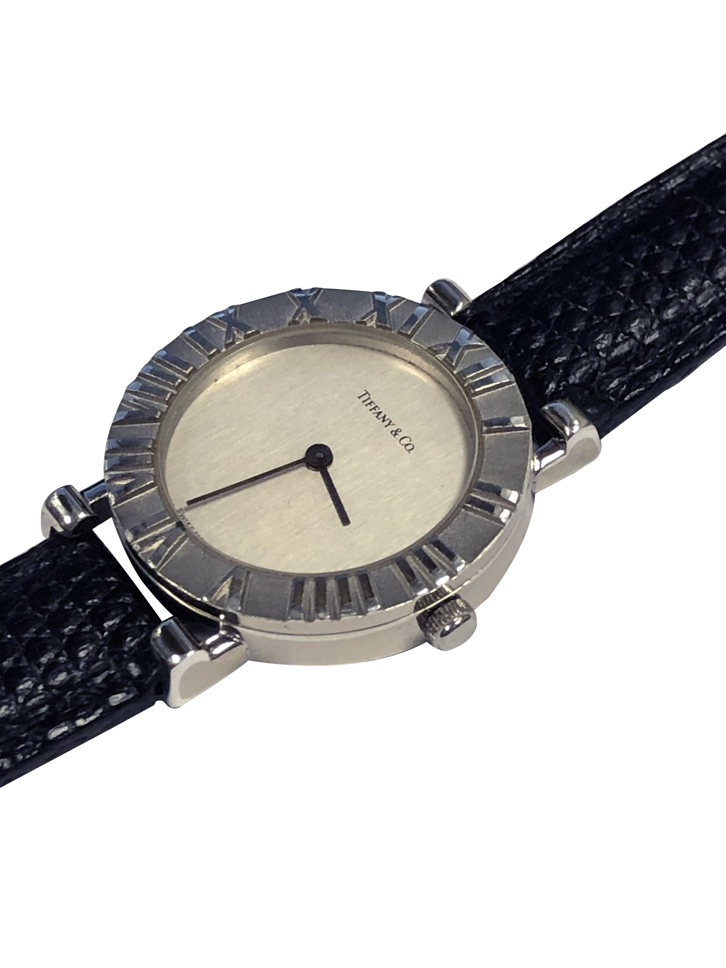 Circa 1990s Tiffany & Company Atlas collection Ladies Wrist Watch, 24 M.M. Sterling Silver 3 piece case, Quartz movement, Silver dial. New, DeBeer Paris Black Lizard strap with original Tiffany Buckle. Comes in the original Tiffany Presentation box.`