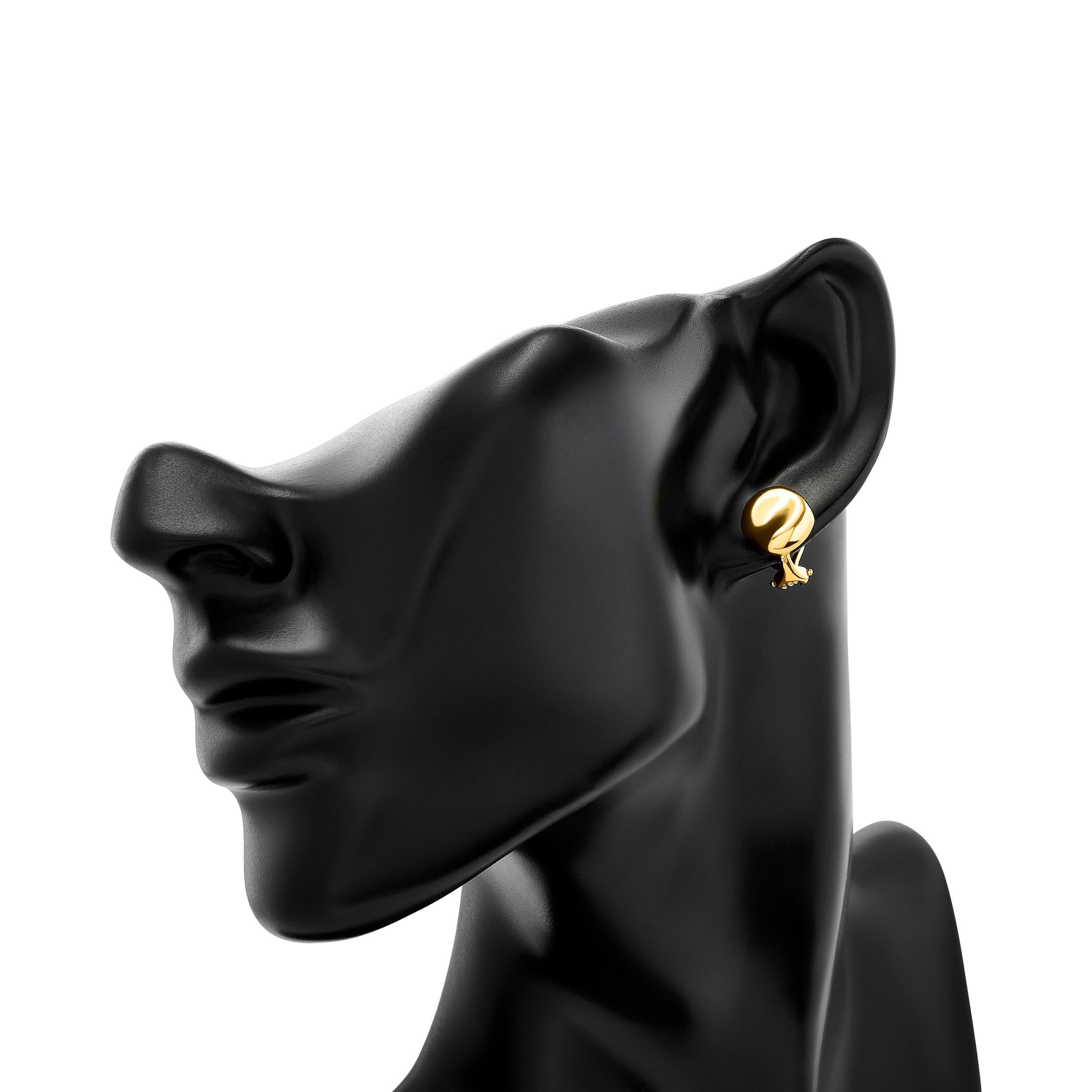 Les boucles d'oreilles haricot en or jaune 18 carats Elsa Peretti de Tiffany & Co. sont une incarnation délicate du style.

Elles sont signées : 