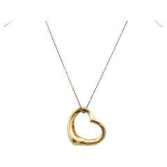 Tiffany & Company Elsa Peretti Floating Heart 18KYG Pendant Necklace Medium Size