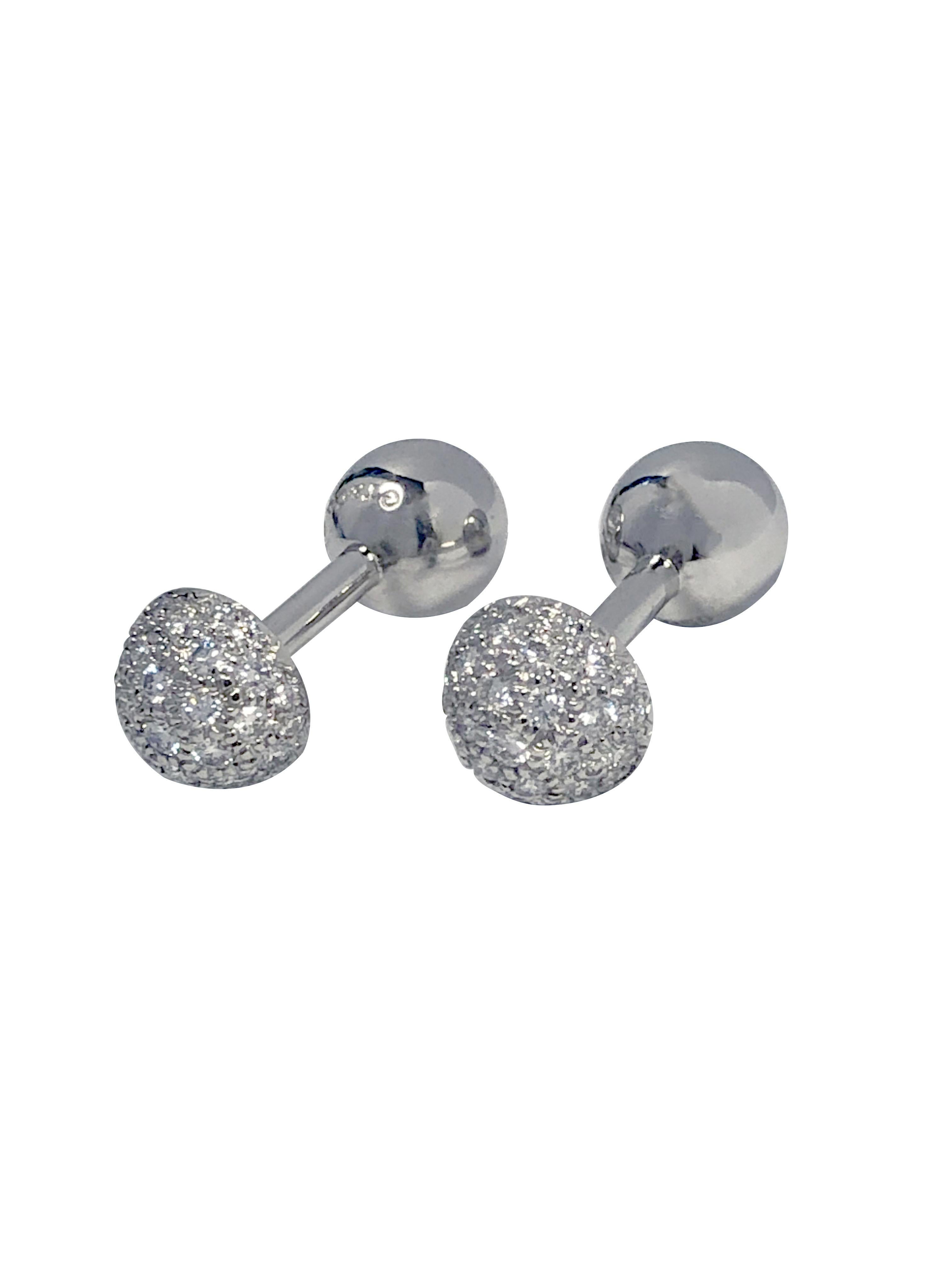 Circa 2000 - 2010 Tiffany & Company Etoile collection Platinum Dumbbell Cufflinks, the domed tops measure 3/8 inch in diameter and are pave set with Round Brilliant cut Diamonds totaling 1. 50 Carats. Come in original Tiffany Presentation box. 