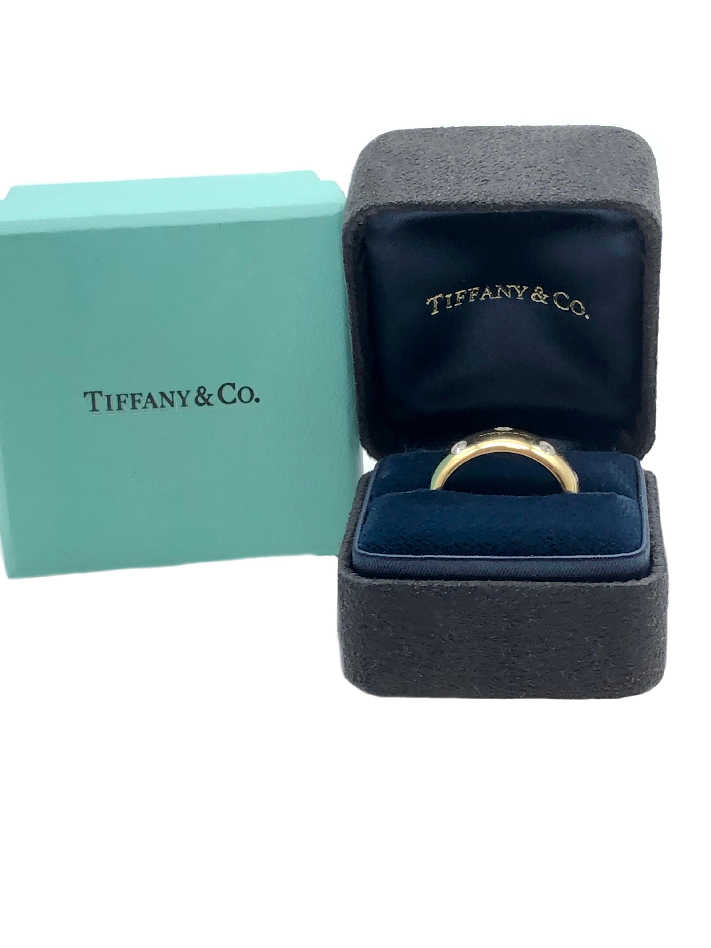 Tiffany & Co. Etoile Gold Platinum and Diamond Wide Band Ring In Excellent Condition In Chicago, IL