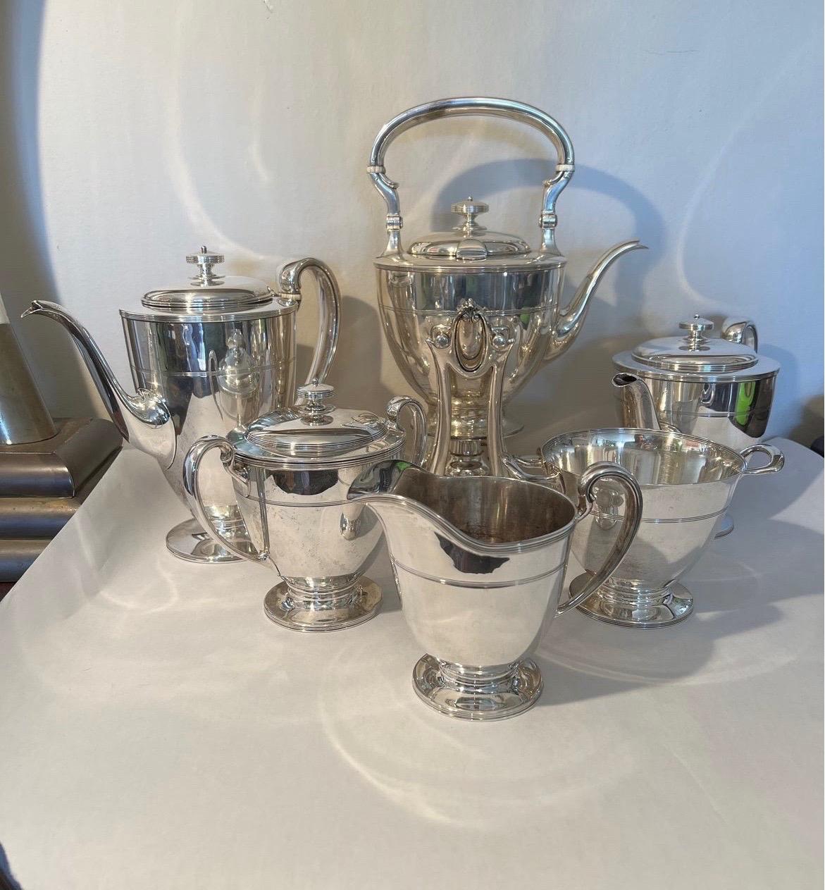 An exceptionally rare Tiffany & Company Sterling silver tea and coffee service in the hampton pattern with extra custom line work engraving. Very early set, not a new production! 
Including:
Coffee pot - 9” h x 9.5” d x 5” w 892g
Teapot - 6.75” h