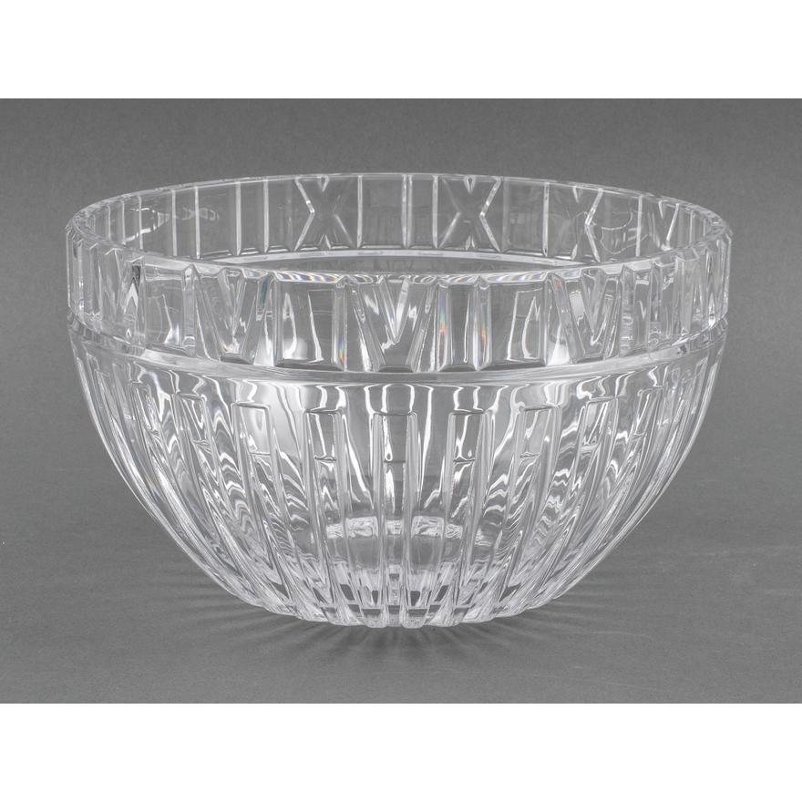 
Immerse yourself in the timeless elegance of the Tiffany & Company Mid-Century Modern Cut Crystal Centerpiece Atlas Bowl. Crafted with precision and artistry, this centerpiece captures the essence of both mid-century design and the renowned Tiffany