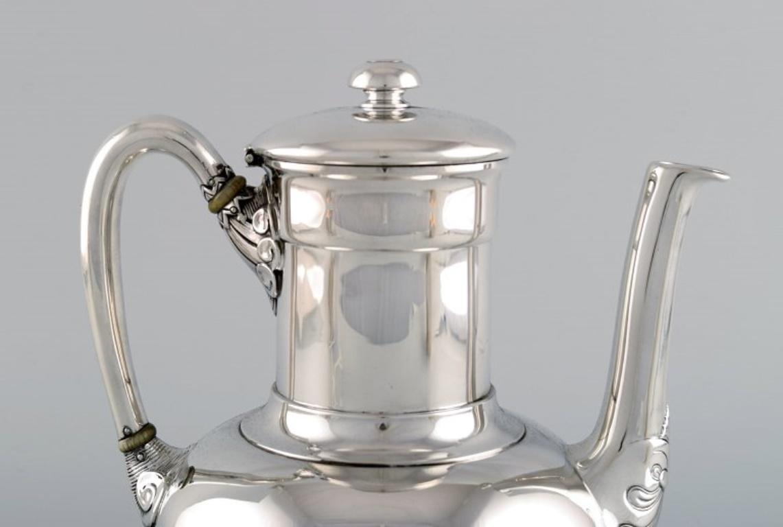 American Tiffany & Company (New York). Coffee pot in sterling silver. Classicist style.