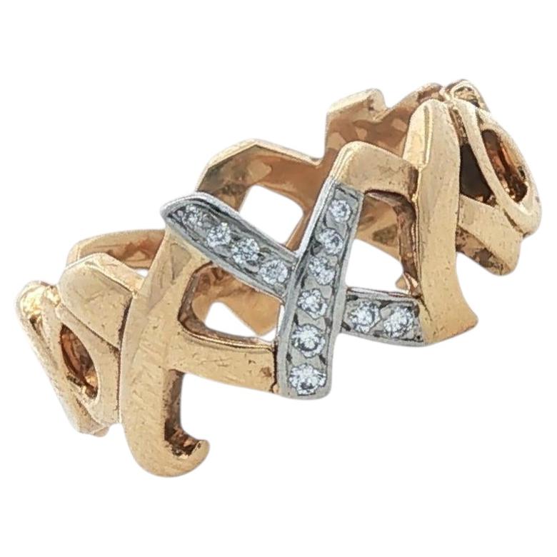 Tiffany & Company Paloma Picasso Diamond 18 Karat Yellow Gold XOXO Band Size 7 For Sale