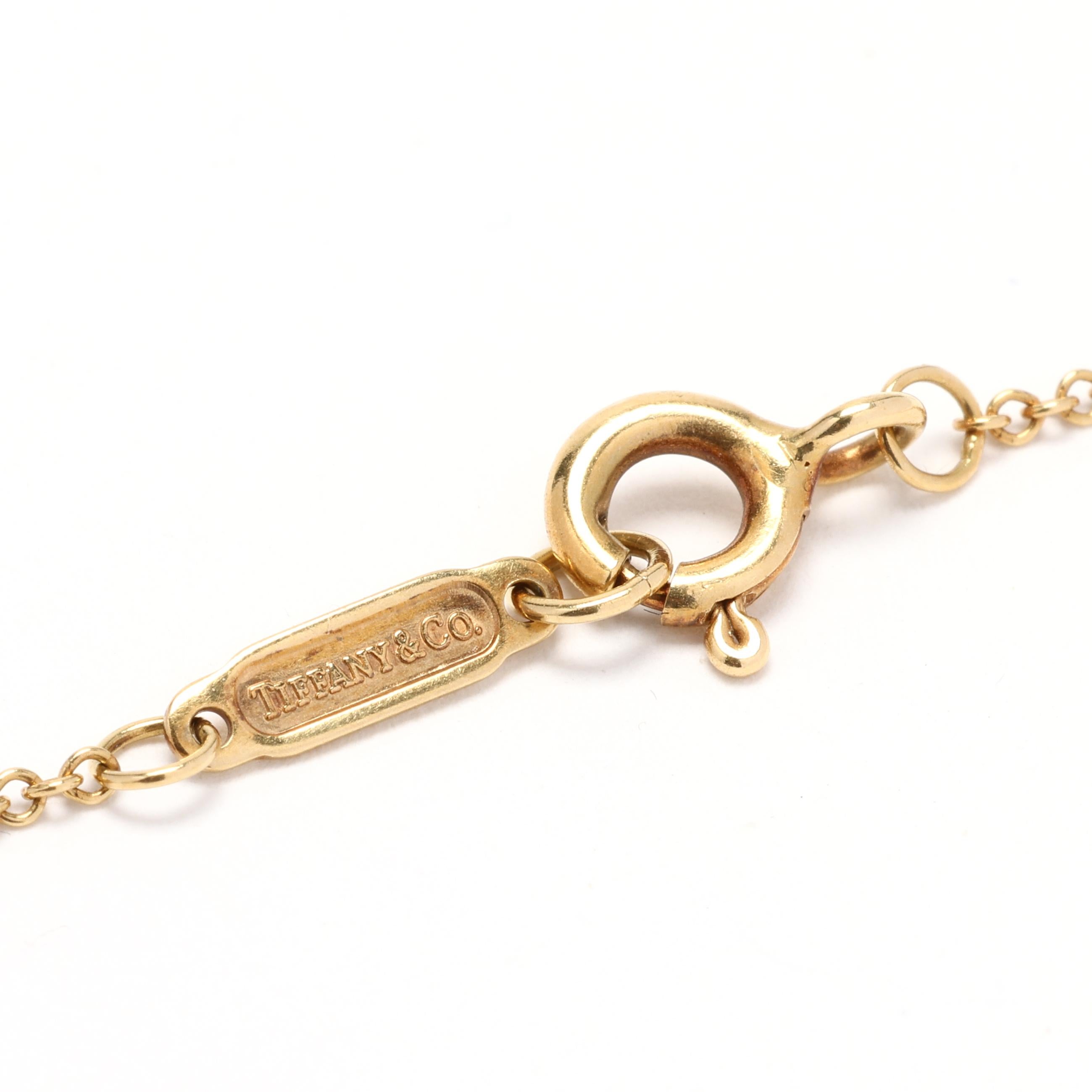 Tiffany & Company Pearl and Diamond Charm Necklace, 18K Yellow Gold Length 16 In In Good Condition In McLeansville, NC