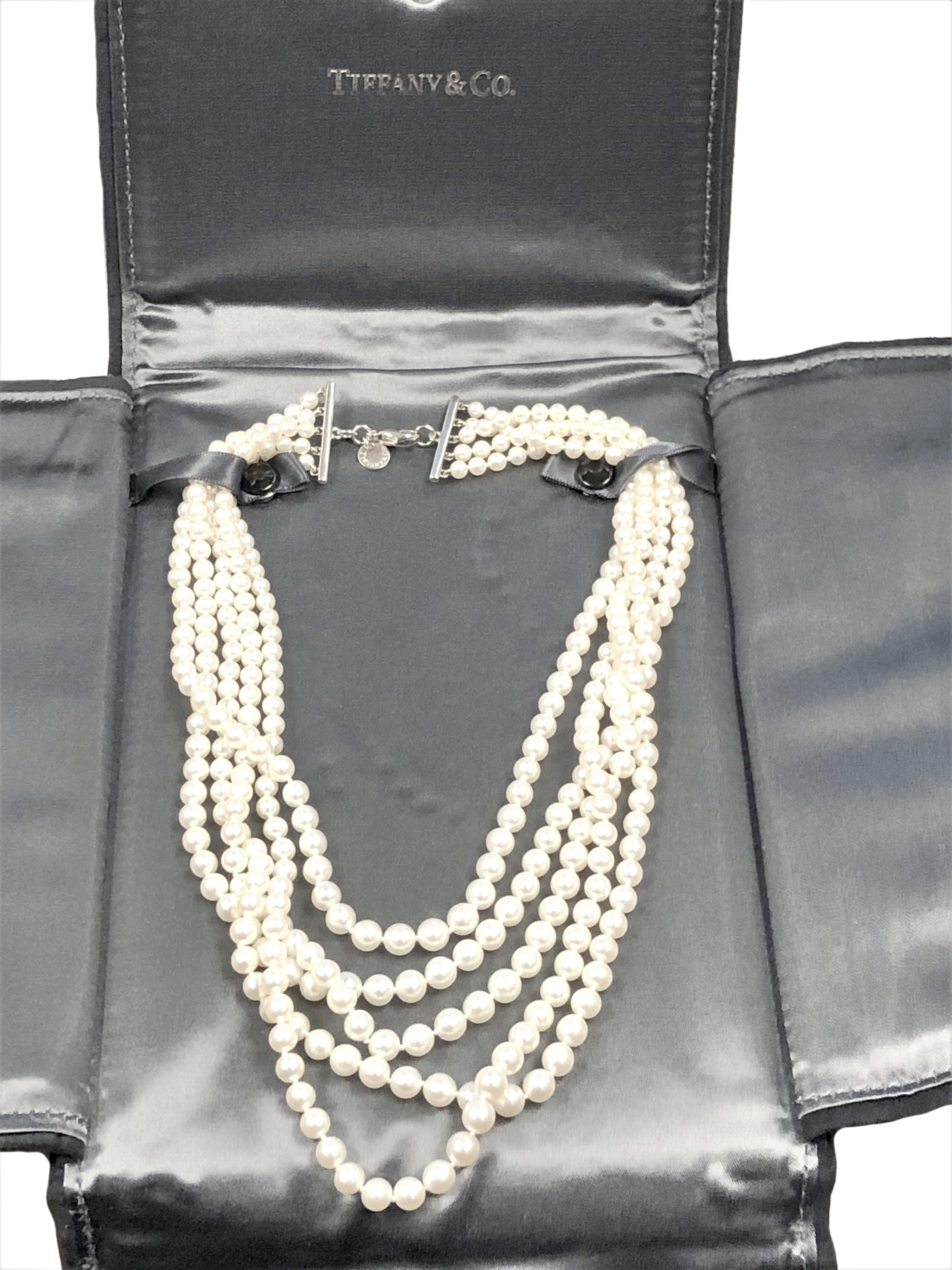 Circa 2018 Tiffany & Company 5 Strand Layered and Graduating Necklace. Comprised of Graduating Strands of 4 M.M. to 6.5 M.M. Culture pearls that are Very Fine Round and Very Fine White Luster with a Hint of Pink Grading as AAA with no surface