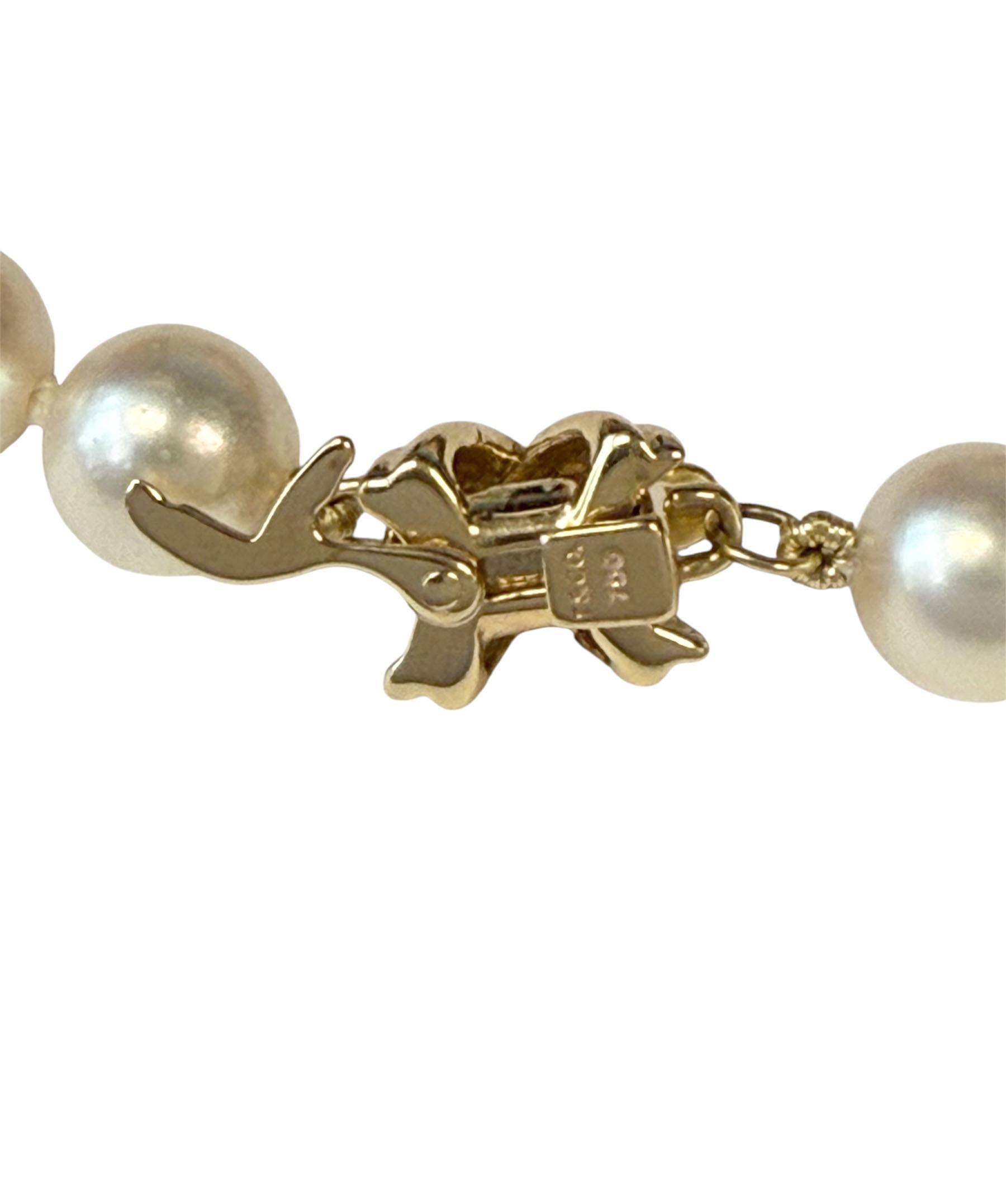 Cabochon Tiffany & Company Pearl Necklace with Gold Signature Clasp For Sale