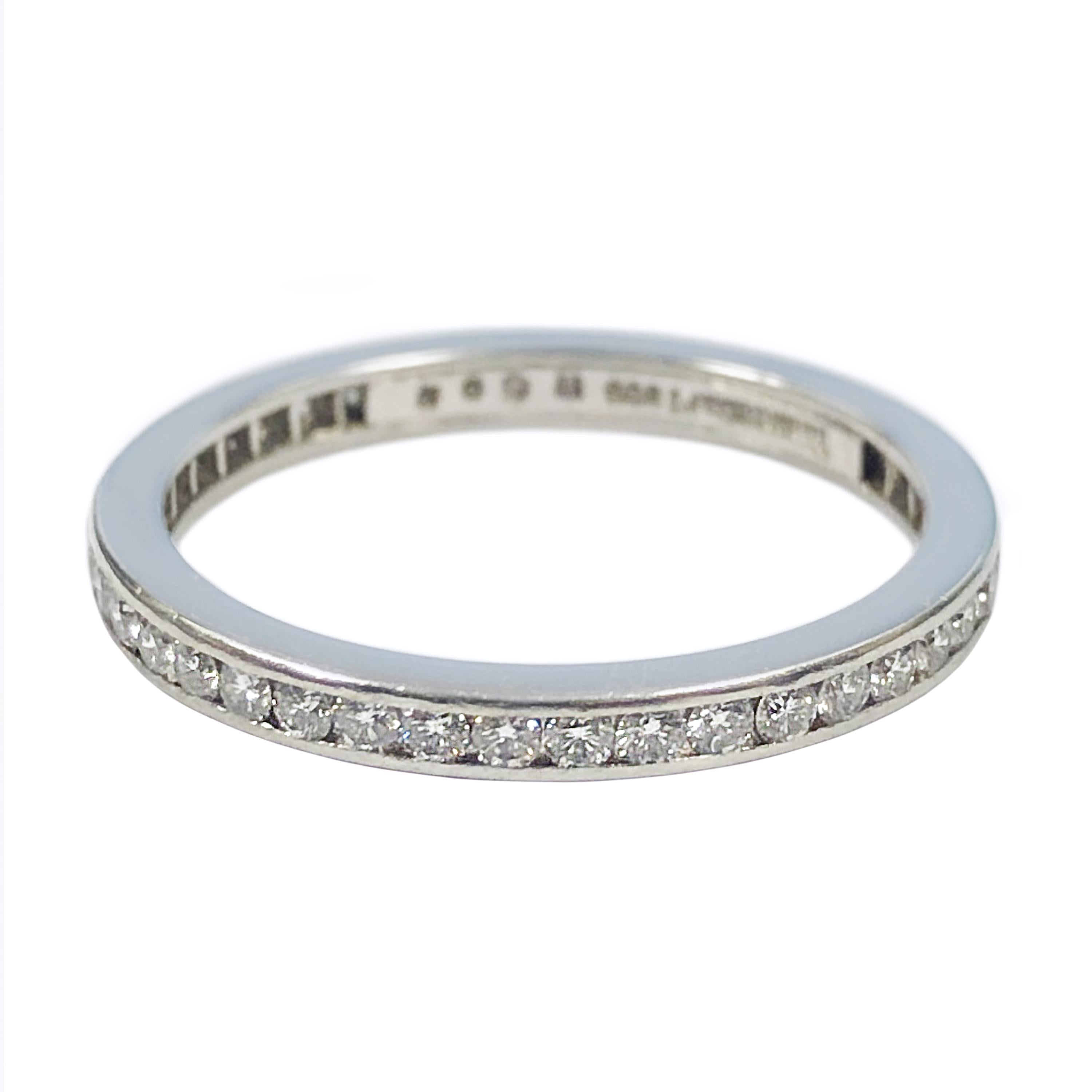 Circa 2010 Tiffany & Company 3 M.M. wide Eternity Band Ring, channel set with round brilliant cut Diamonds totaling 1 Carat.  Finger size 7.