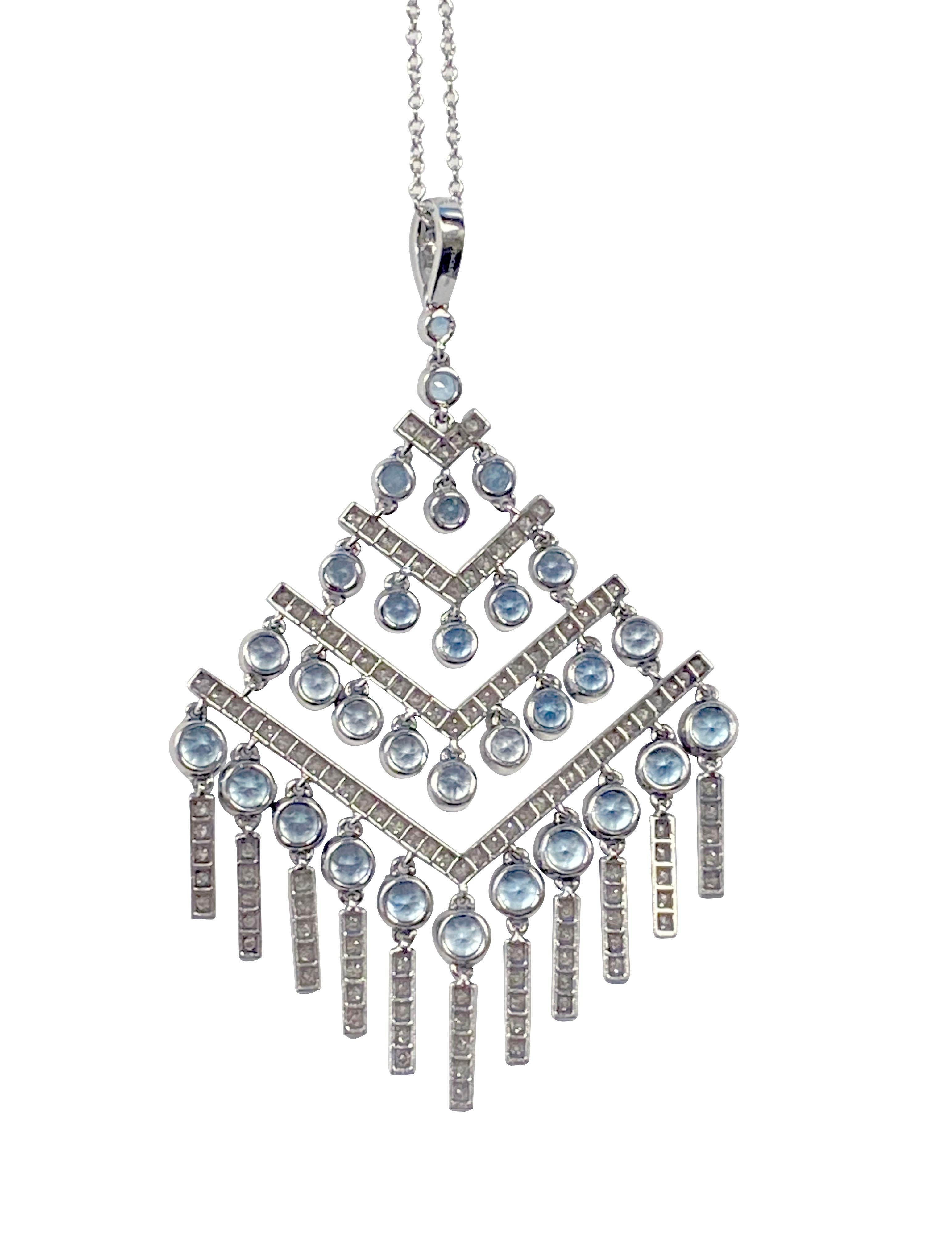 Circa 2000 Tiffany & Company Art Deco Style Pendant Necklace, the all Platinum Fringe Pendant measures 2 1/4 inches in length X 1 1/2 inches, set with Fine Color Round Aquamarines and Round Brilliant cut Diamonds totaling approximately 2 carats.