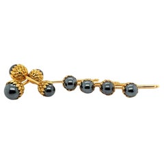 Tiffany & Company Schlumberger Hematite 18 Karat Yellow Gold 4 Stud Tuxedo Set.