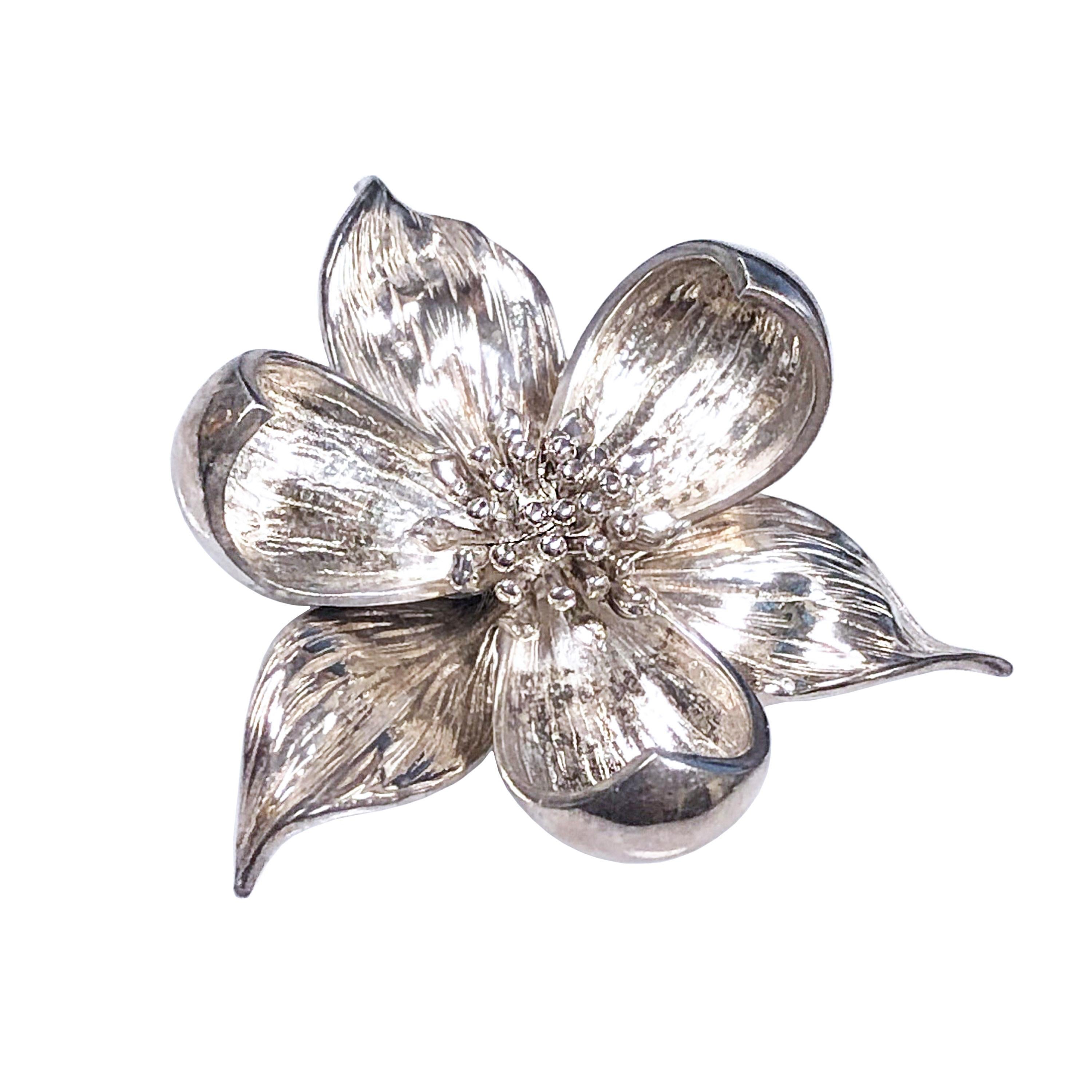 Circa 1980s Tiffany & Company Sterling Silver Orchid Brooch, measuring 1 3/4 inches in length and 1 1/2 inches wide. Excellent unworn condition.