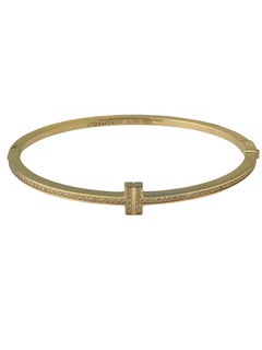 Tiffany & Company "T" Yellow Gold and Diamond Bangle Bracelet