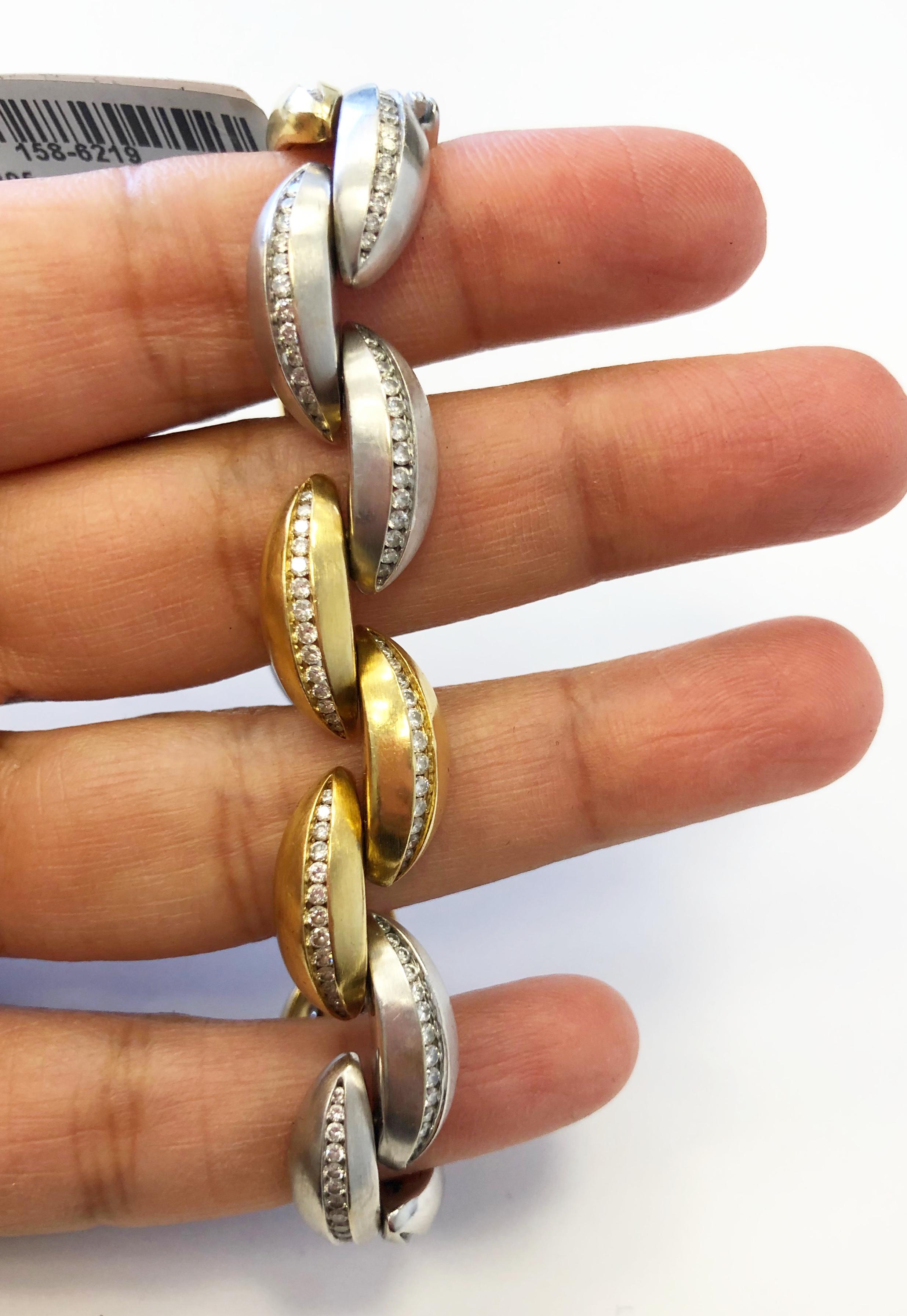 Stunning Tiffany & Company two tone gold bracelet with good quality, white diamonds weighing 3 carats.  Length of bracelet is 7.5