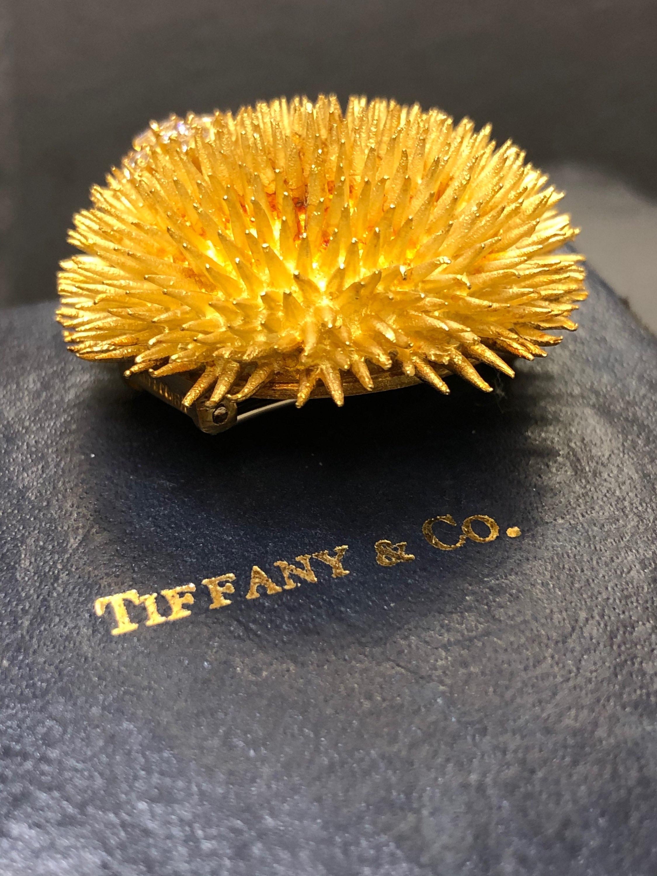 Here is a very hard-to-find piece of Tiffany & Company jewelry. This large size sea urchin brooch is circa 1960’s and from their very well known collection. The rarity in this one is that the section of gemstones is all diamond and completely