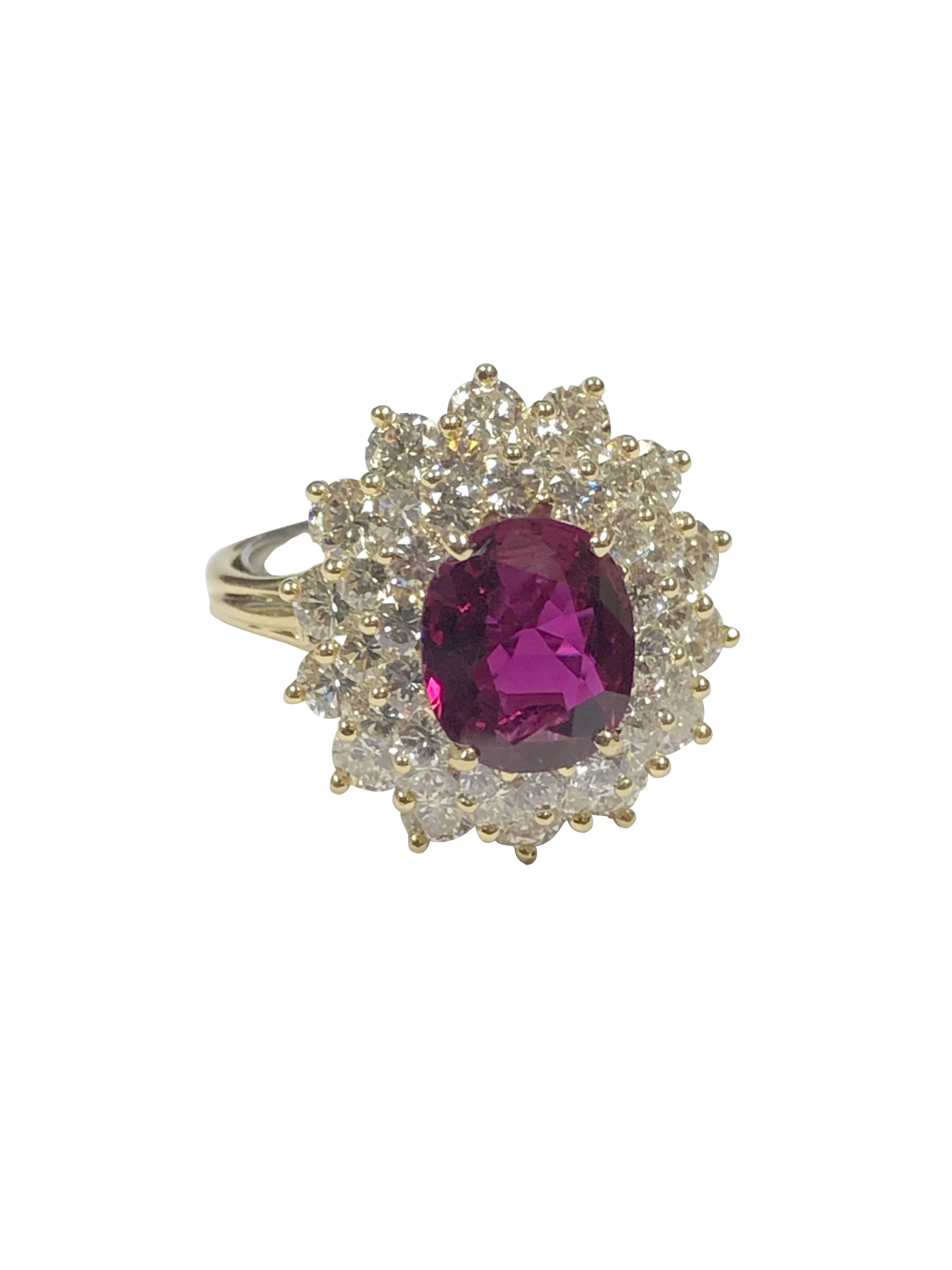 Circa 1980s Tiffany & Company 18k Yellow Gold Ring, centrally set with a 2.21 carat Oval Step Cut Ruby that is Thai is Thai in Origin, G.I A analysis shows that this stone is Heat treated, showing more of a pigeon Blood Red in color with light