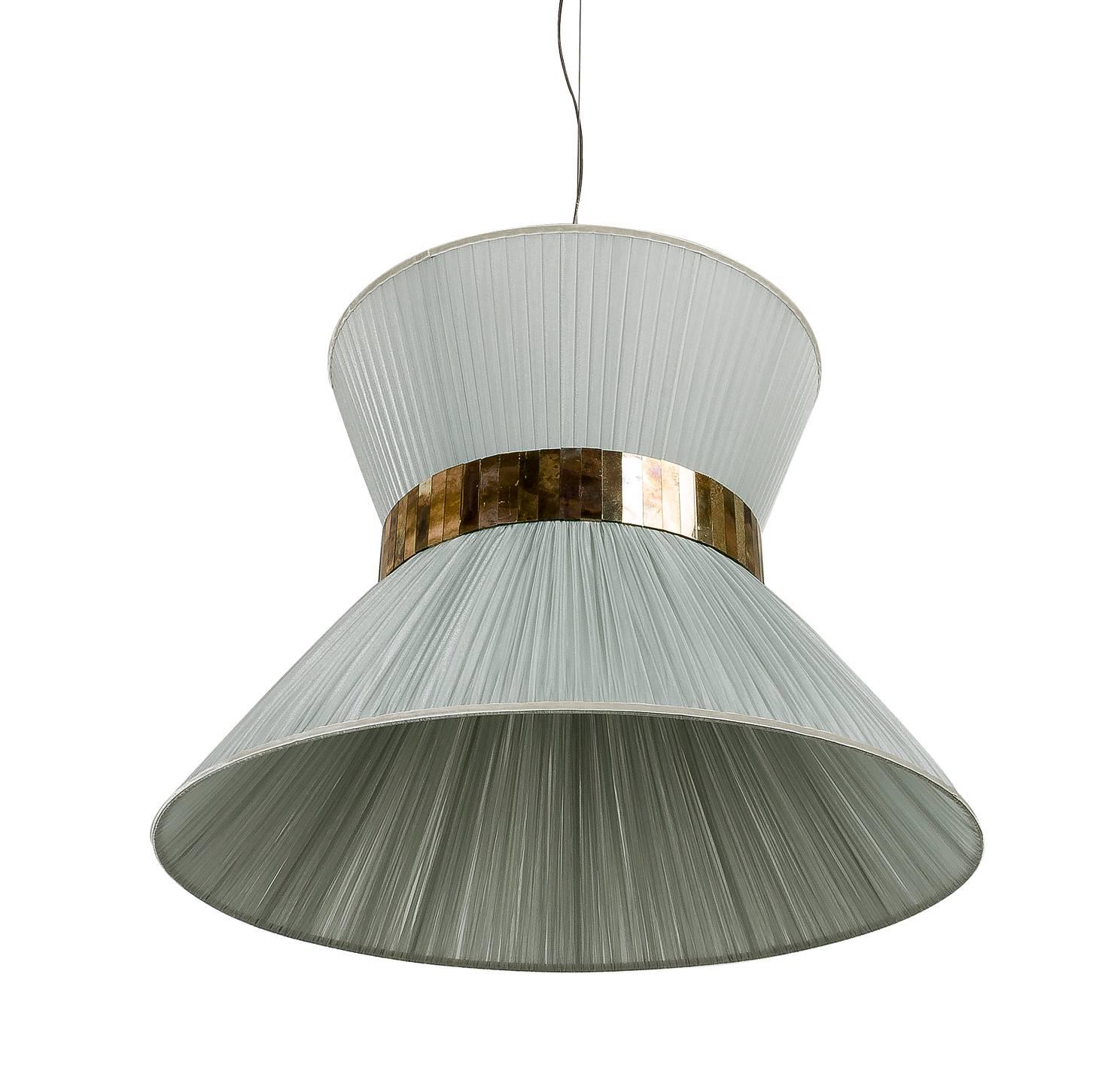 This light object  is a contemporary piece, entirely made in Tuscany and produced 100% by hand in Sabrina Landini's atelier. 
The Tiffany lamp is Sabrina's first creation and is inspired by Audrey Hepburn's timeless charm. Attractive, transversal,