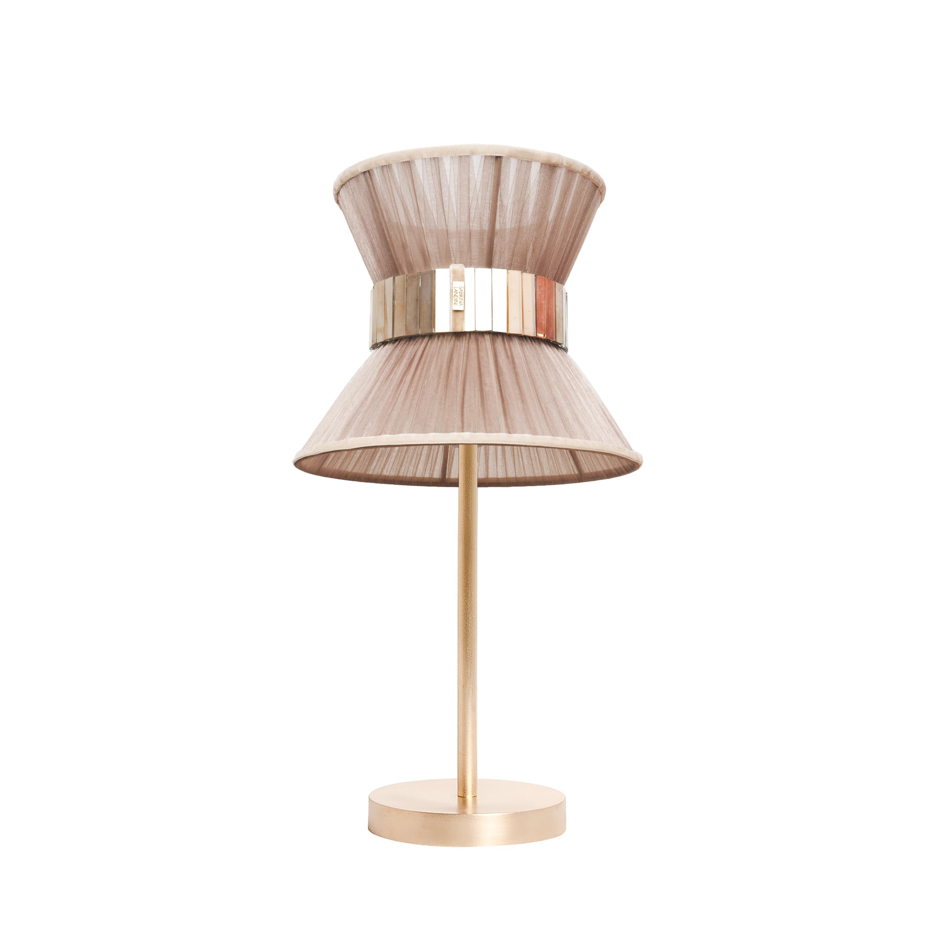 TIFFANY the iconic lamp!

Tiffany, a timeless lamp, inspired by the international movie “Breakfast at Tiffany” and the talented character Audrey Hepburn, is a contemporary lamp, entirely made in Tuscany, Italy and 100% of Italian origin.

Thanks to