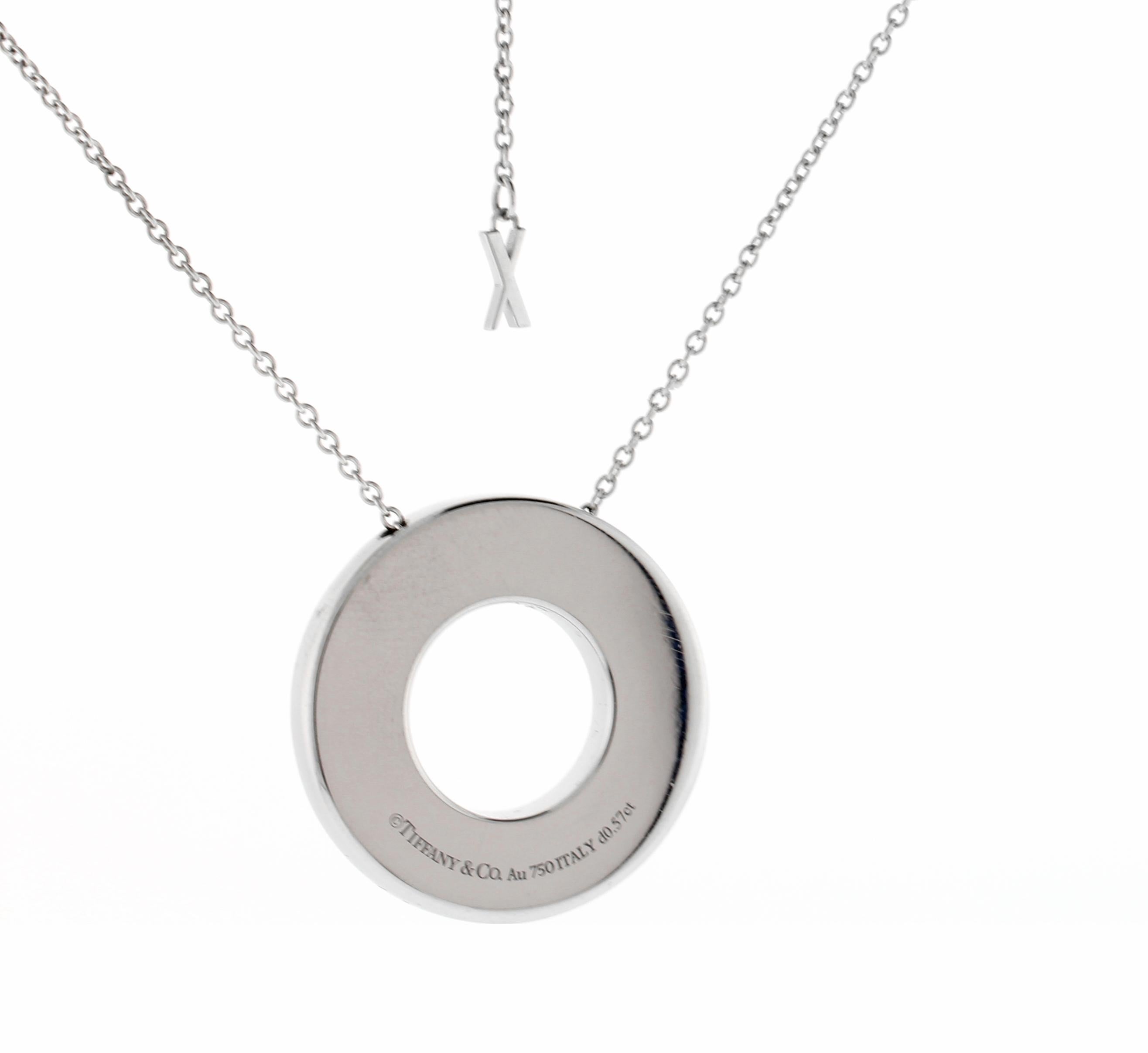 From Tiffany & Co, this pendant is from the Atlas Collection.
• Designer: Tiffany & Co.
• Metal: 18 karat white gold
• Circa: 2022
• Diamond: 265= .57 carats
• Circle motif, 1